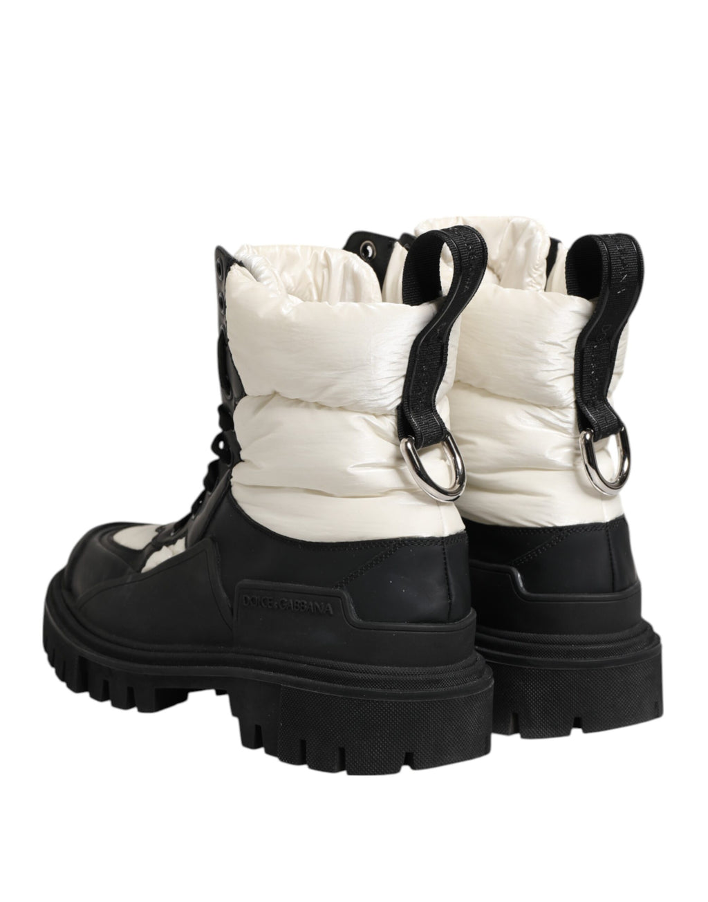 Bottes noires et blanches Dolce & Gabbana, en cuir rembourré mi-mollet avec lacets, style élégant et tendance.
