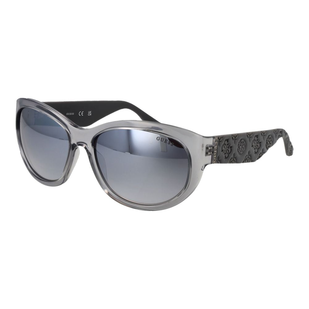 Lunettes de soleil Guess en acier inoxydable gris, avec monture élégante et branches fines, vues de face sur fond blanc.