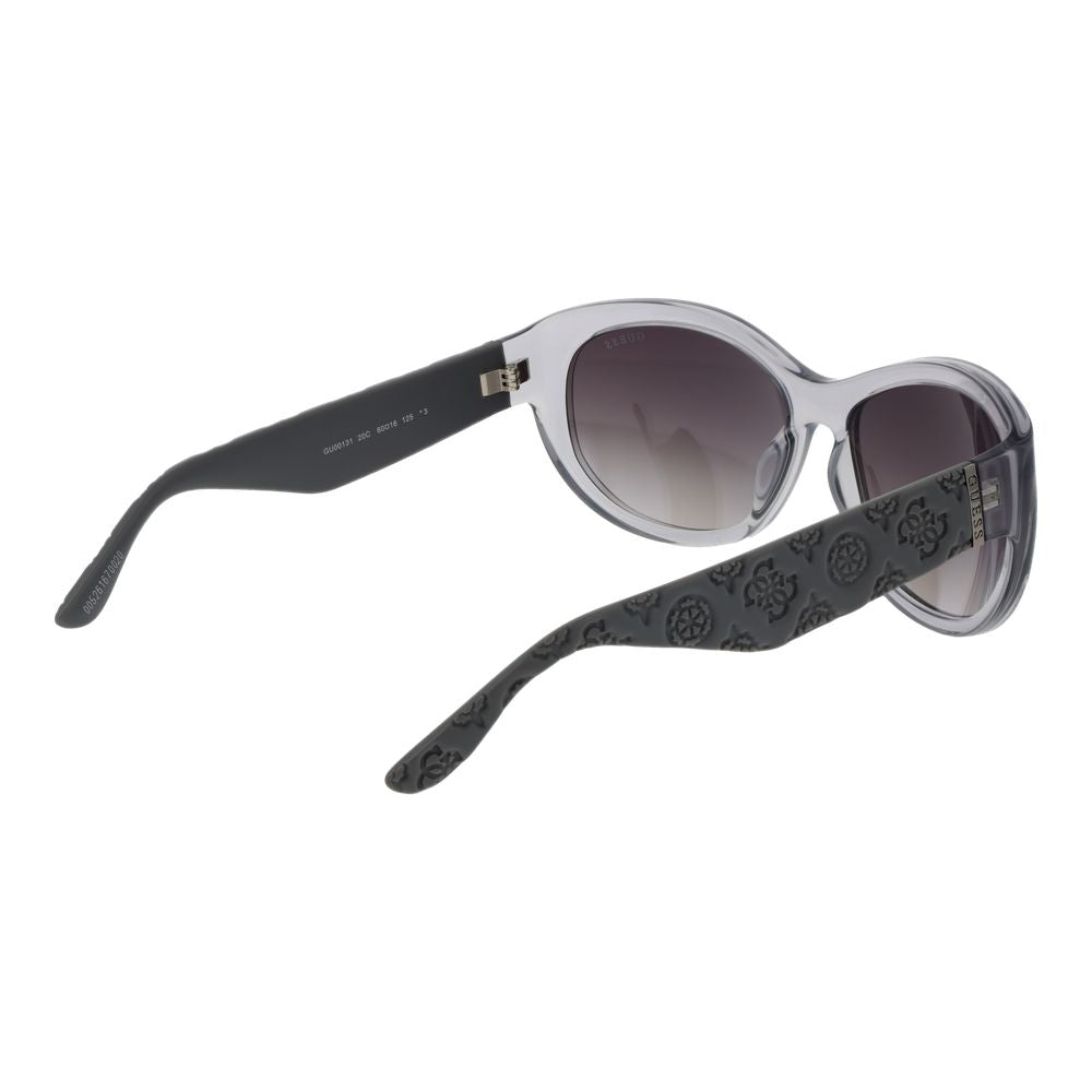 Lunettes de soleil Guess en acier inoxydable gris, design élégant, monture large et verres teintés pour un style moderne.