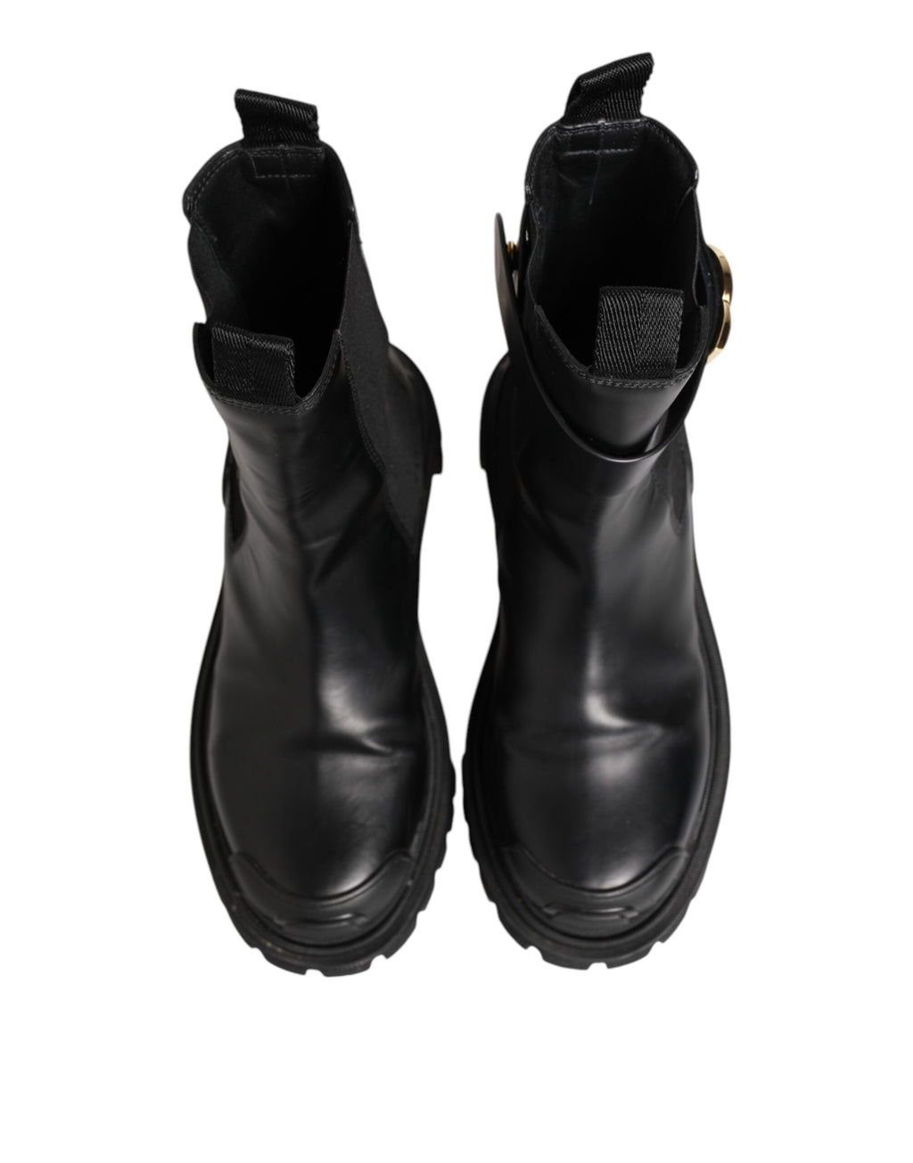 Bottes de randonnée Dolce & Gabbana noires et dorées avec logo DG, en cuir, hauteur mi-mollet, style élégant et tendance.
