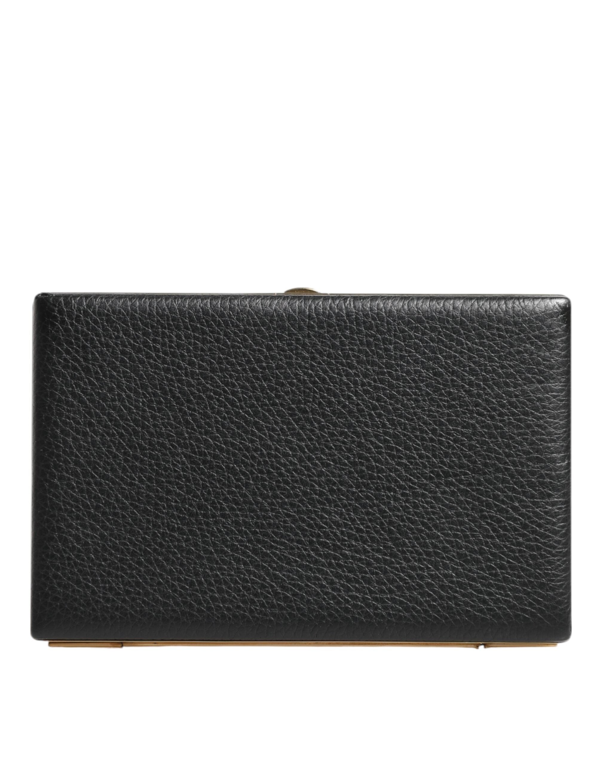 Sac pochette Dolce & Gabbana en cuir noir avec cadre doré, idéal pour soirée et fêtes, élégant et sophistiqué.
