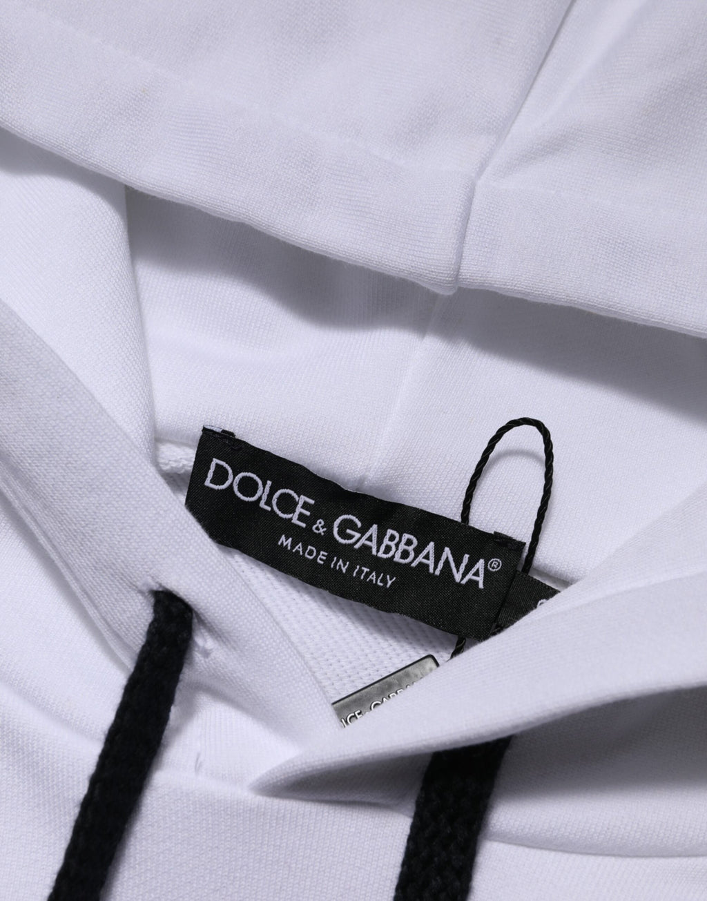 Sweat à capuche blanc Dolce & Gabbana Sacred Heart avec motif orné, tissu doux et design élégant visible sur l'image.