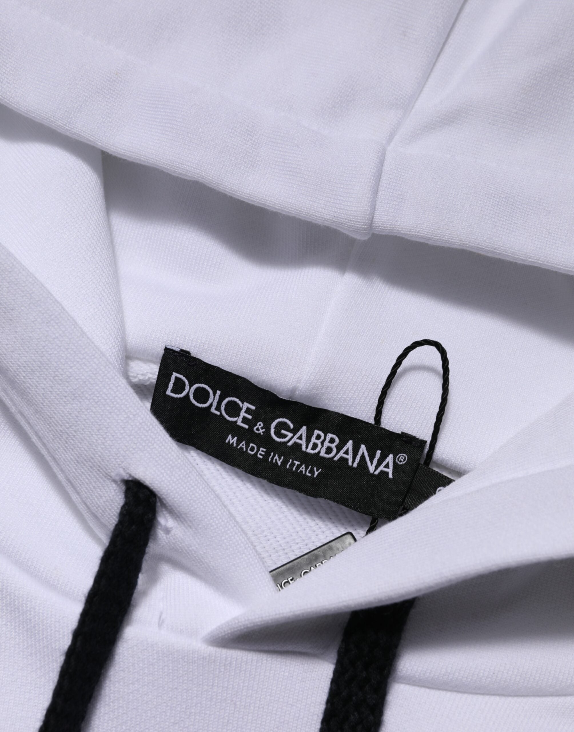 Sweat à capuche blanc Dolce & Gabbana Sacred Heart avec motif orné, tissu doux et design élégant visible sur l'image.