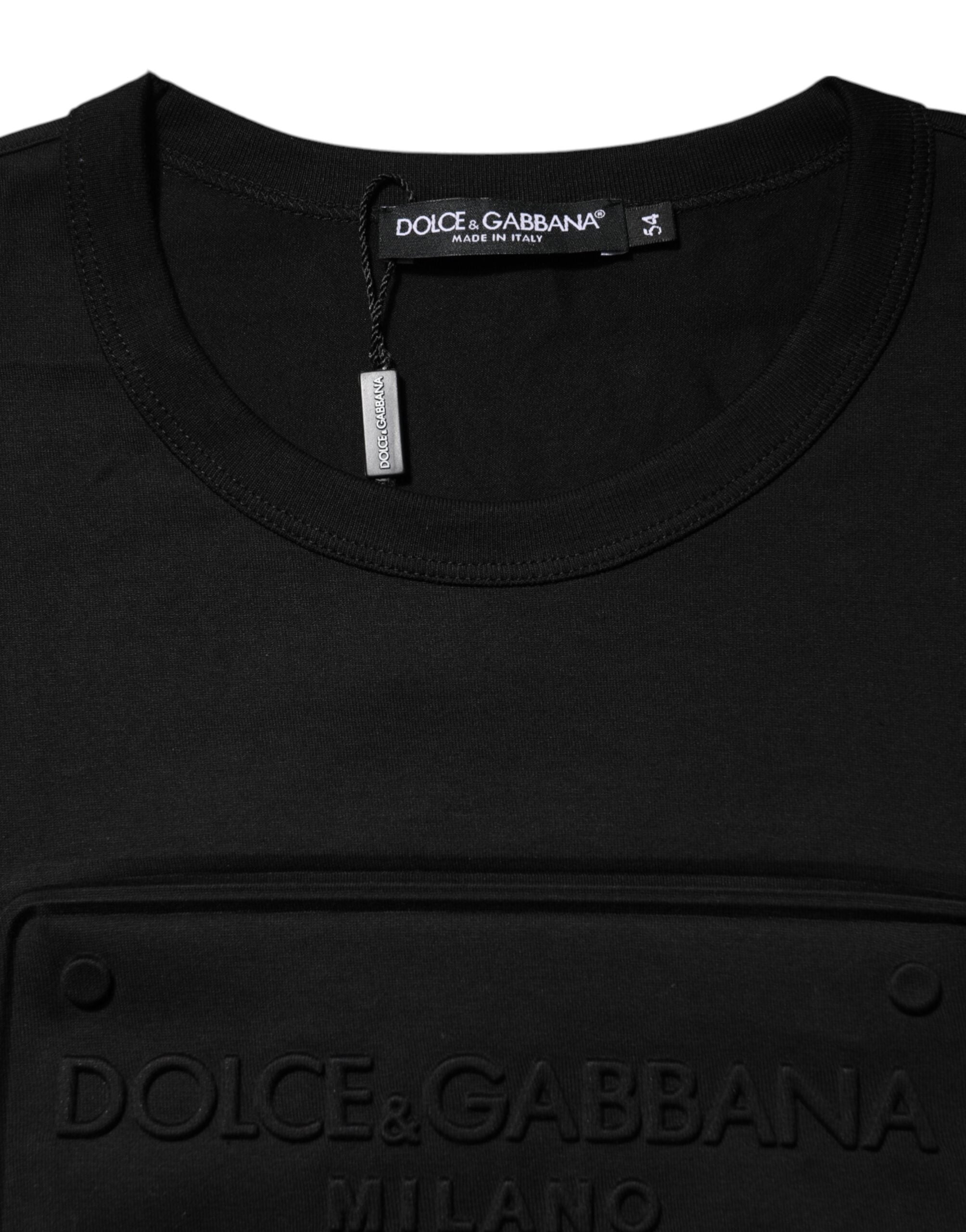 T-shirt Dolce & Gabbana en coton noir avec logo embossé, col rond et design élégant visible en gros plan.