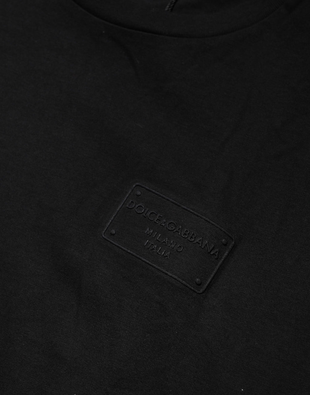 T-shirt en coton noir Dolce & Gabbana avec plaque logo, col rond, vue de face.