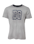 T-shirt en coton gris Dolce & Gabbana avec imprimé graphique DG, col rond, design moderne visible sur l'image.