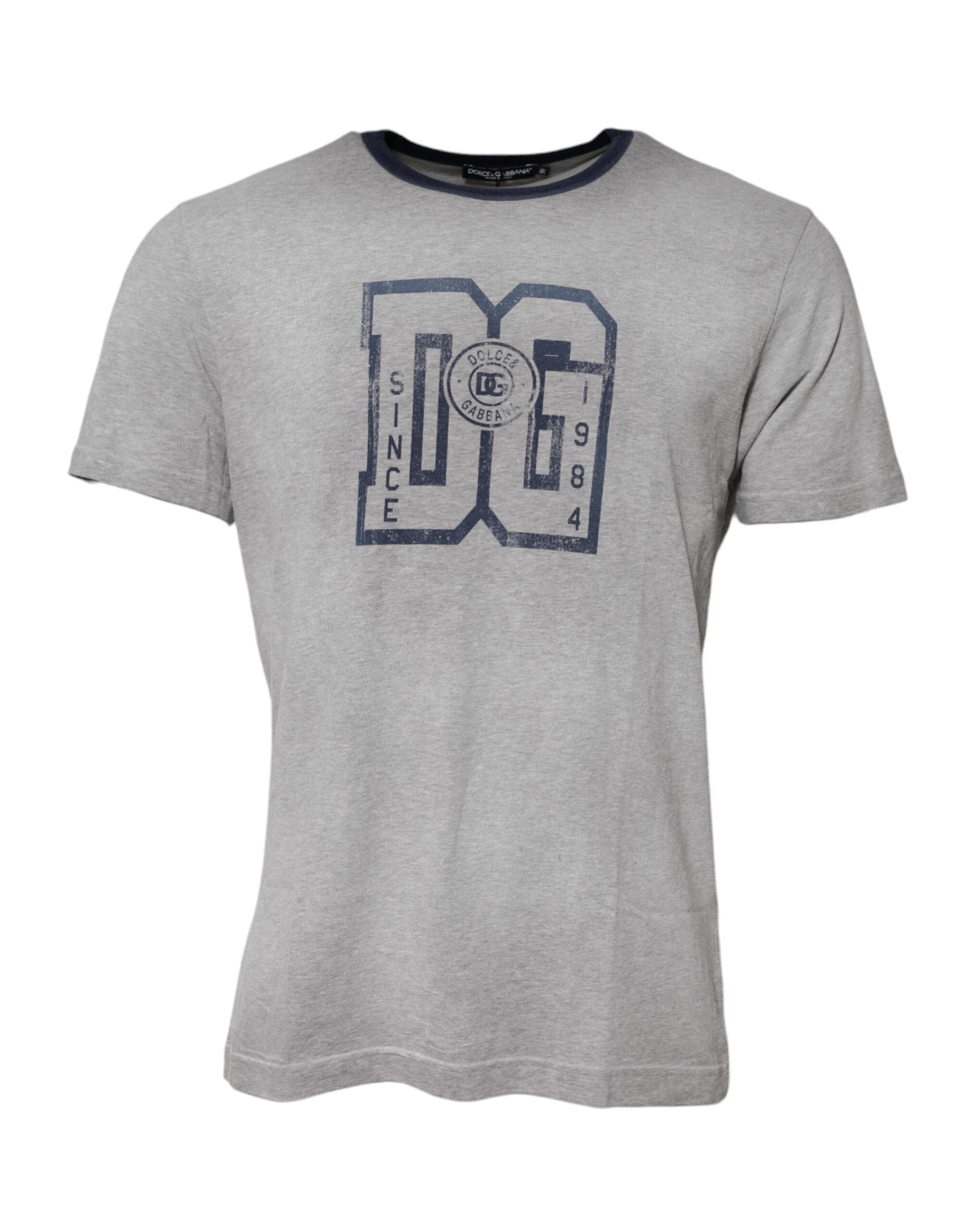 T-shirt en coton gris Dolce & Gabbana avec imprimé graphique DG, col rond, design moderne visible sur l'image.