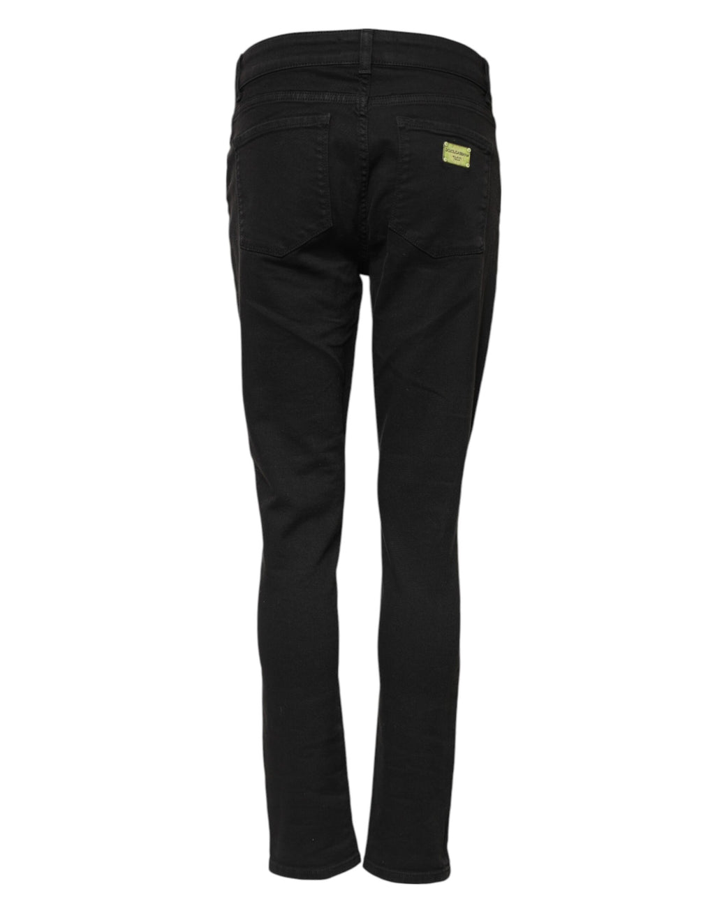 Jeans skinny en coton noir Dolce & Gabbana à taille mi-hauteur, denim ajusté avec poches et coutures visibles.