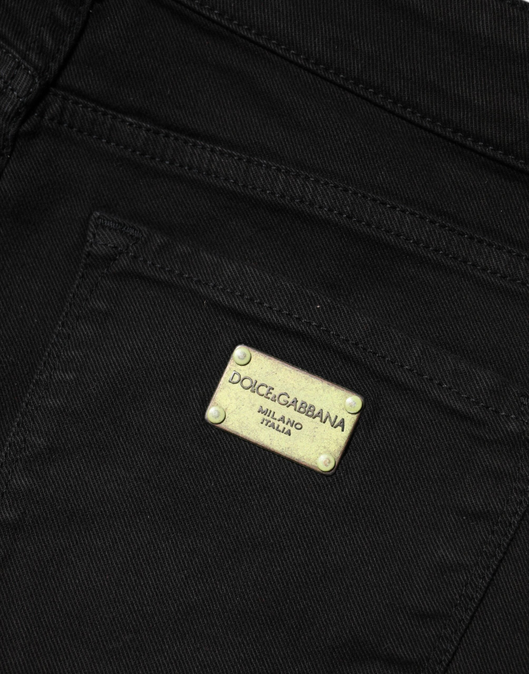 Jean skinny noir en coton Dolce & Gabbana, taille mi-haute, denim moulant et élégant, visible avec détails de couture.