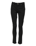 Jeans en denim skinny noir Dolce & Gabbana en coton à taille mi-haute, vue frontale.