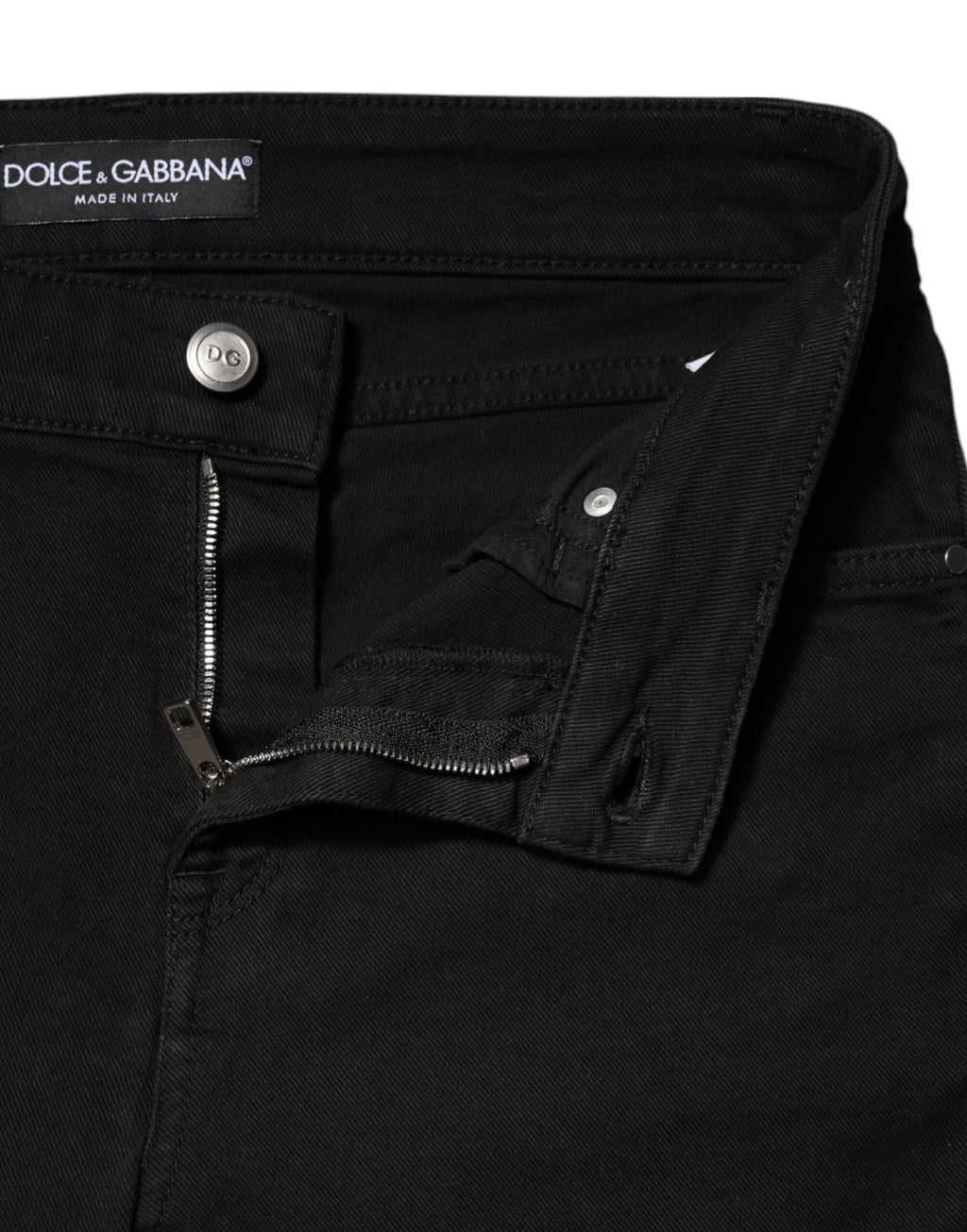 Jeans skinny en coton noir Dolce & Gabbana à taille mi-hauteur, design ajusté et élégant.