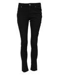 Jeans slim en coton noir Dolce & Gabbana avec taille mi-haute, coupe ajustée, détails modernes et couture élégante.