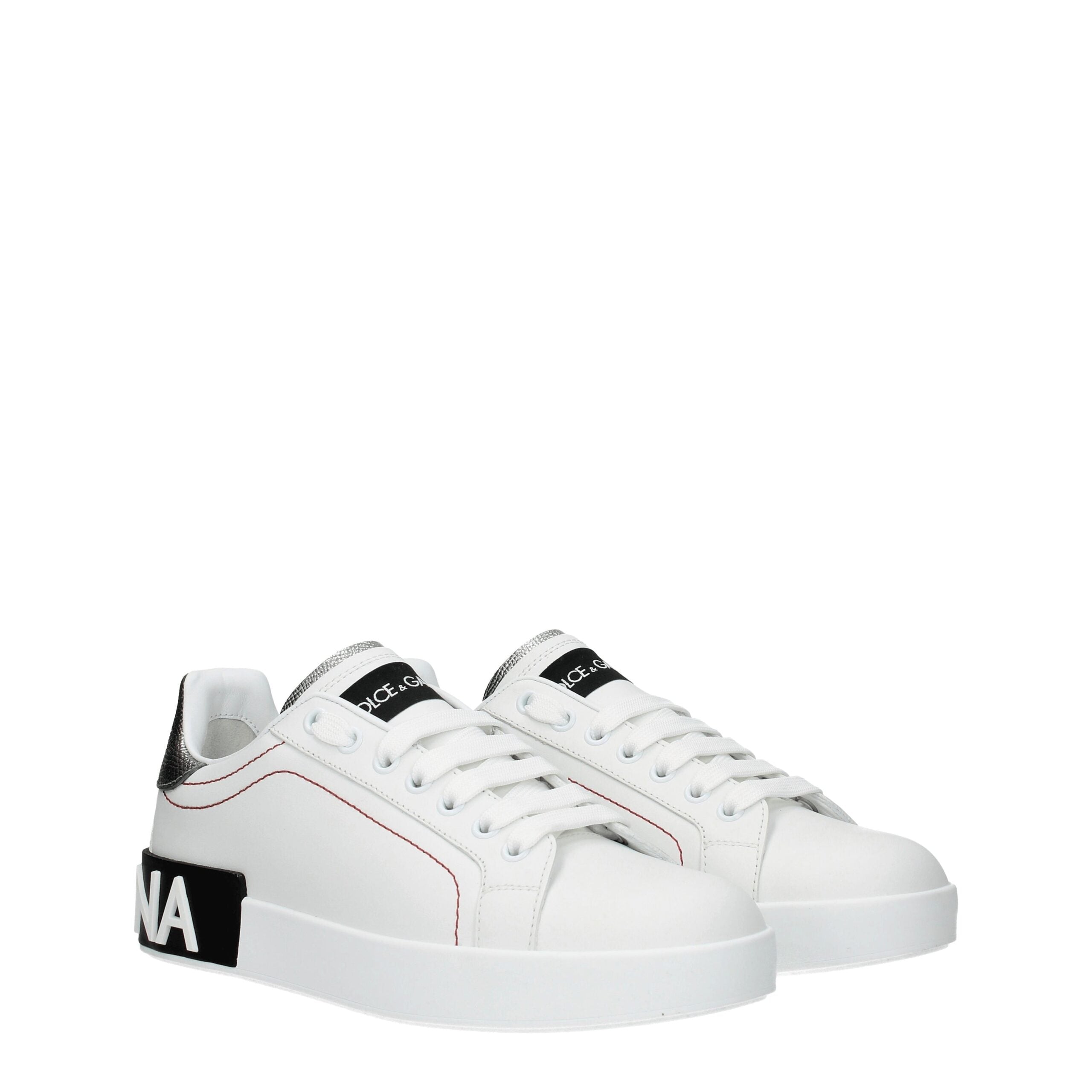 Chaussures basses en cuir blanc de Dolce & Gabbana, sneakers modernes pour homme avec semelle blanche et design élégant.