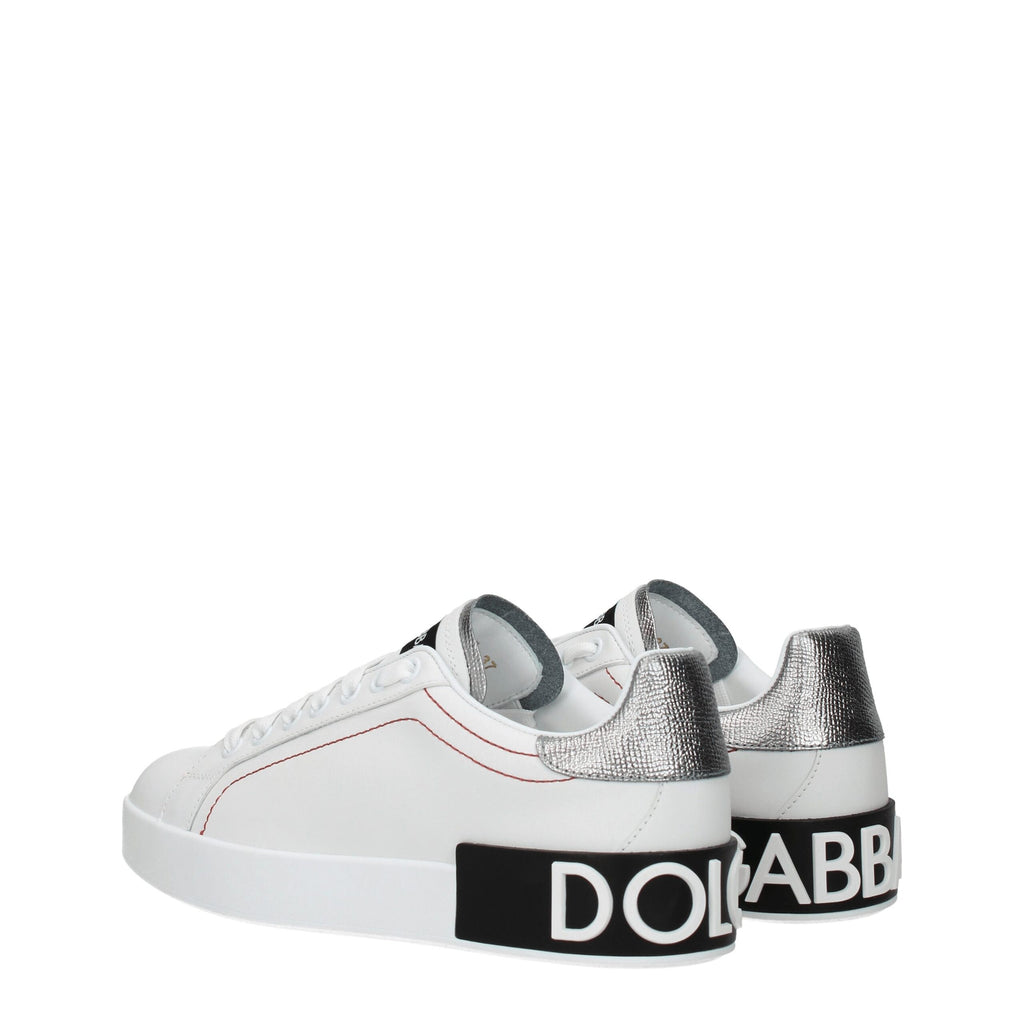 Chaussures sneakers basses en cuir blanc Dolce & Gabbana, modèle décontracté et élégant, vues de face sur fond neutre.