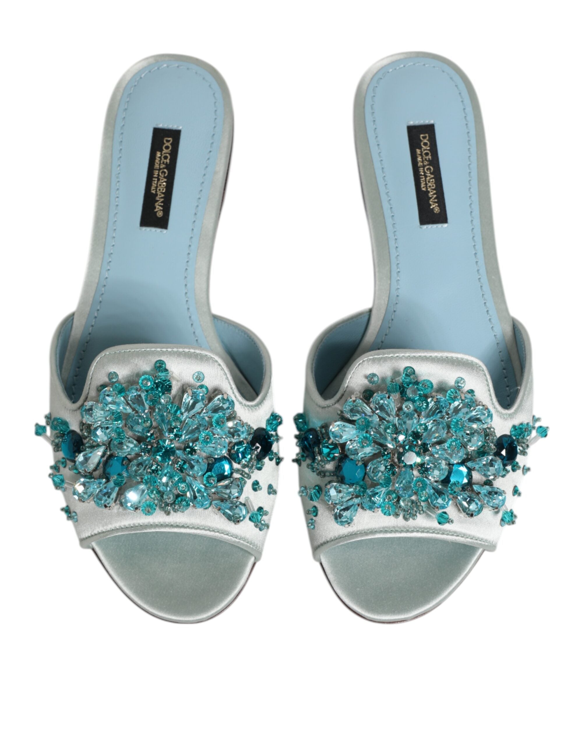 Sandales Dolce & Gabbana en cuir argenté et bleu avec perles décoratives, style slide pour femme.