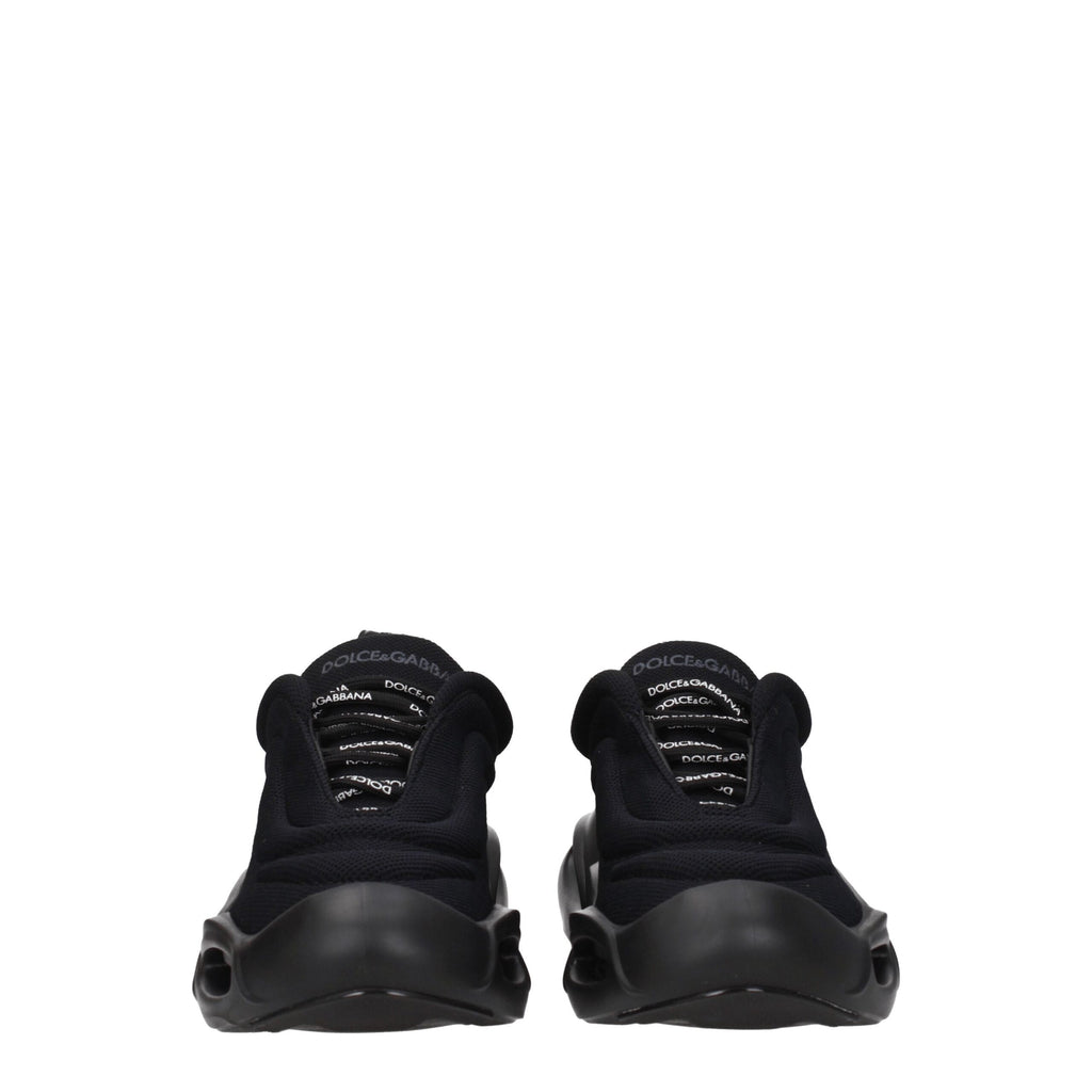 Chaussures chunky Dolce & Gabbana en tissu noir avec semelle épaisse, style sneakers tendance et confortable.