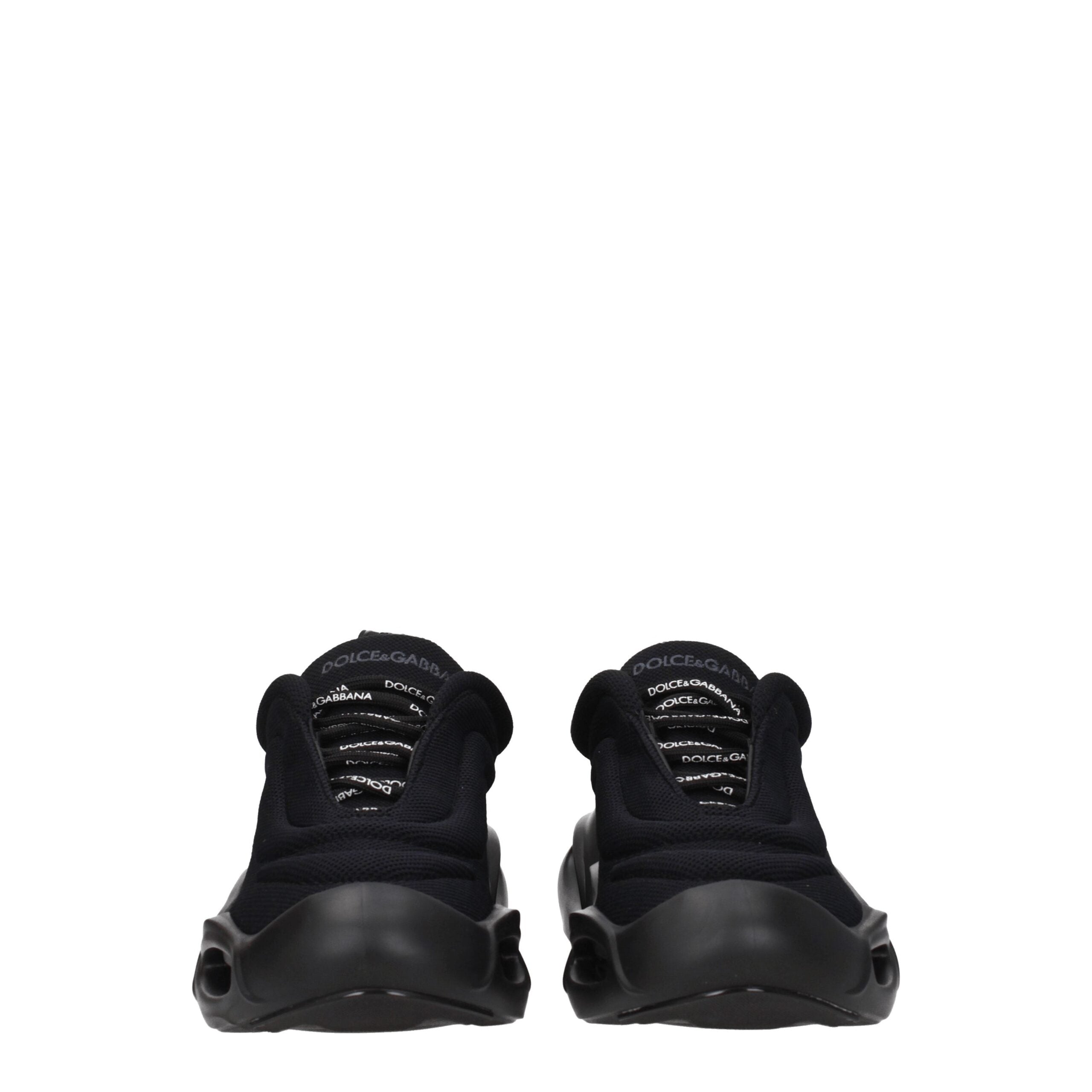 Chaussures chunky Dolce & Gabbana en tissu noir avec semelle épaisse, style sneakers tendance et confortable.