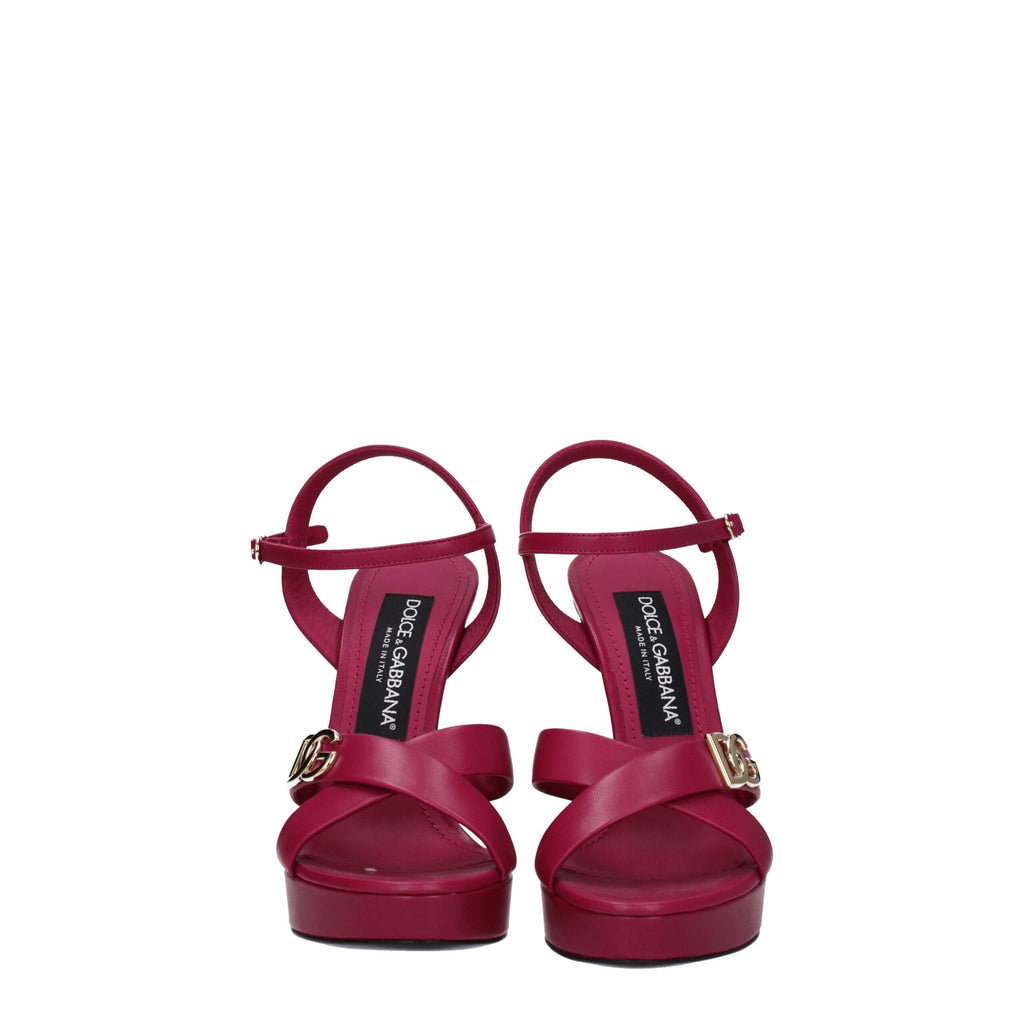 Sandales plateforme en cuir rose Dolce & Gabbana, ouvertes avec talons hauts et brides élégantes pour femme.