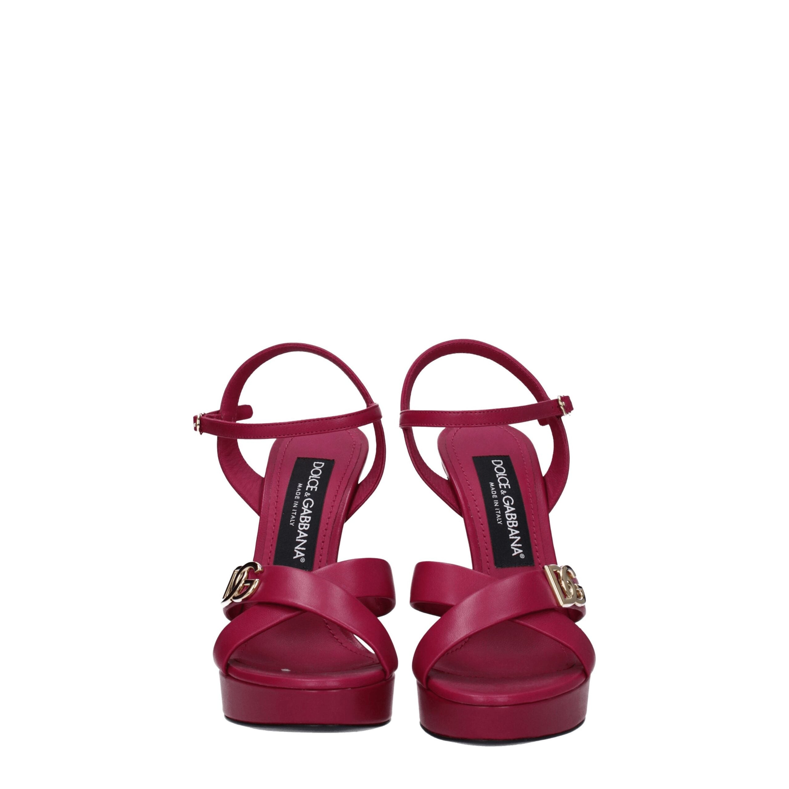 Sandales plateforme en cuir rose Dolce & Gabbana, ouvertes avec talons hauts et brides élégantes pour femme.