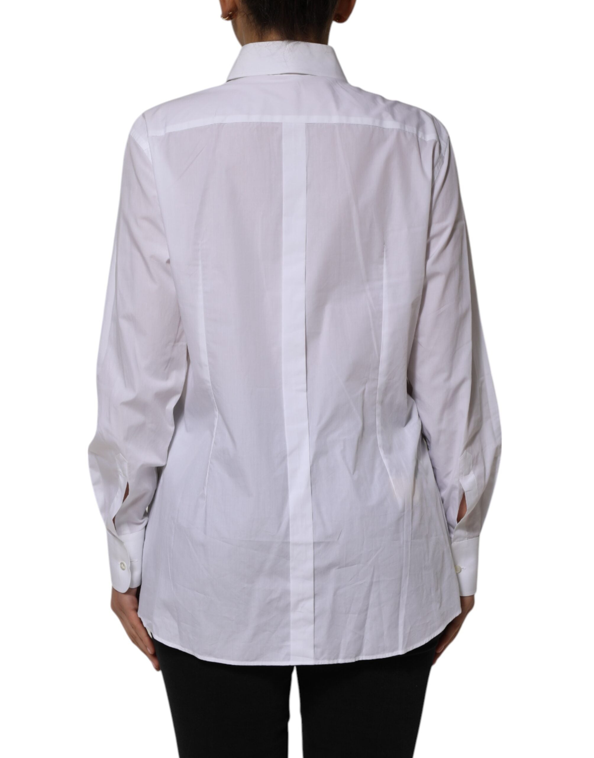 Chemise blanche en coton à col et manches longues de Dolce & Gabbana, vue de face, détails du tissu et du col visibles.