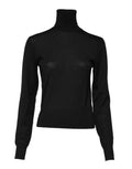 Pull en cachemire noir Dolce & Gabbana à col roulé, détail du tissu doux et élégant, porté sur un mannequin.