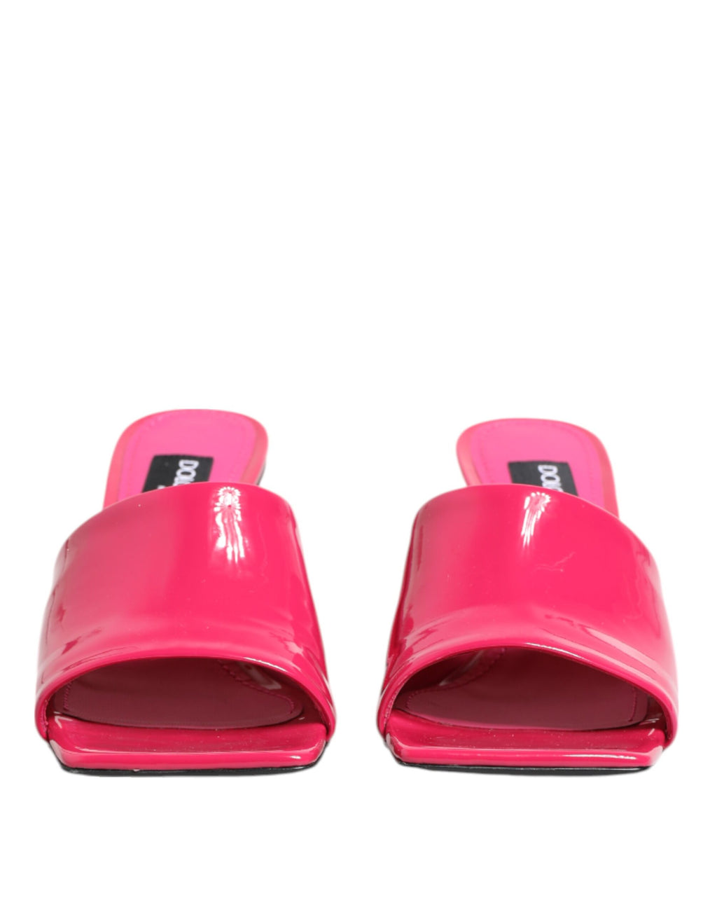 Sandales Dolce & Gabbana à talons bloc ouverts roses, mules élégantes avec semelle en cuir et design à la mode.