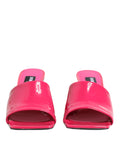 Sandales Dolce & Gabbana à talons bloc ouverts roses, mules élégantes avec semelle en cuir et design à la mode.