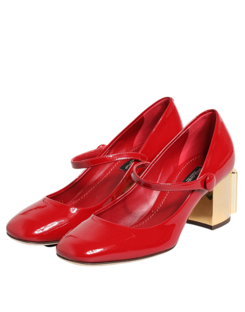 Sandales à talons en cuir rouge Dolce & Gabbana avec logo DG, semelle élégante et design sophistiqué.