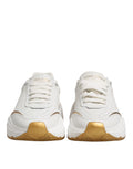 Chaussures sneakers Dolce & Gabbana DAYMASTER en cuir blanc et or, style élégant et moderne pour hommes.
