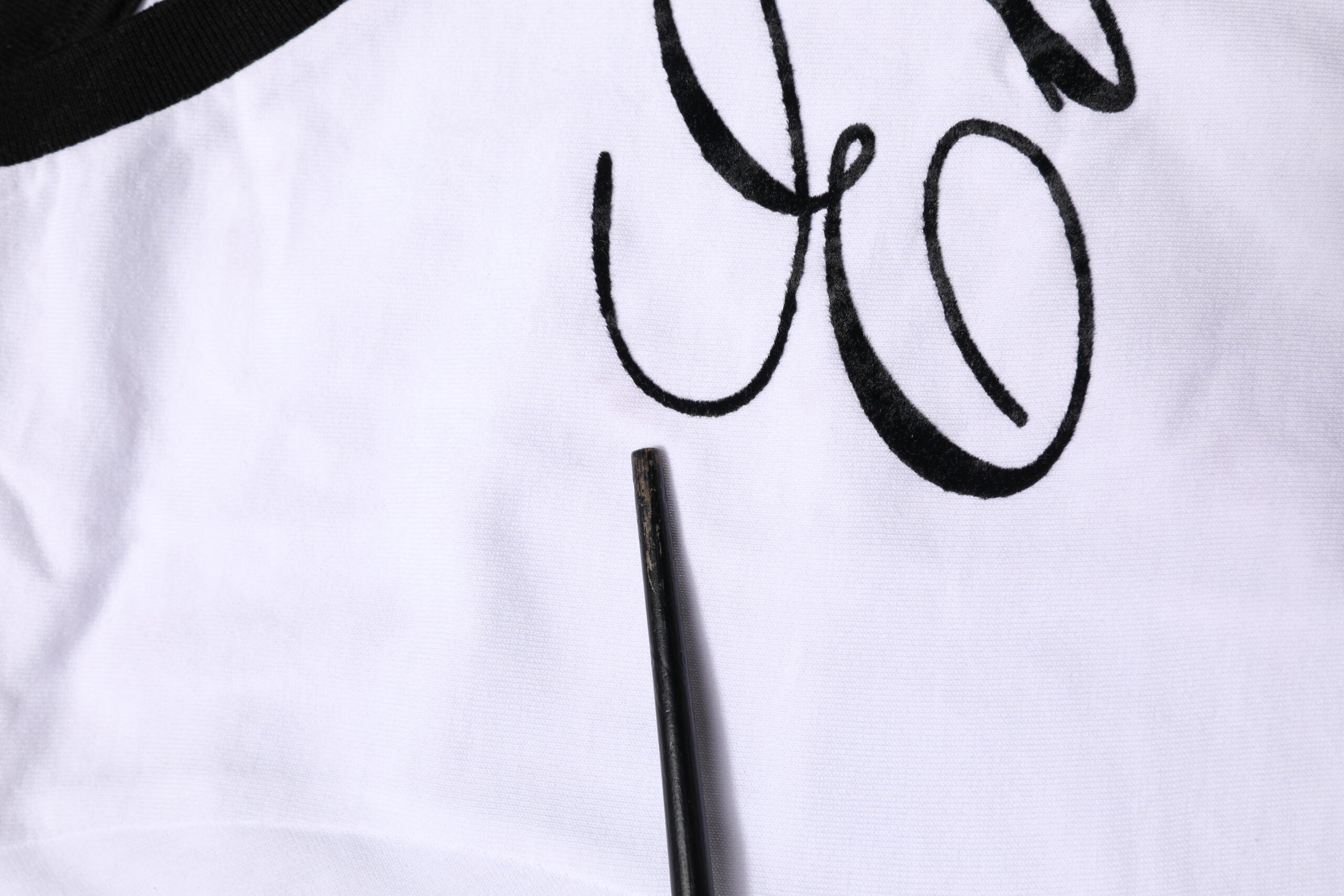 T-shirt blanc Dolce & Gabbana Eleganza en coton à col rond, vue de face, tissu doux et coupe classique pour homme.