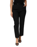 Pantalon noir en laine Dolce & Gabbana, taille haute et coupe tapered, vue de face sur le mannequin.