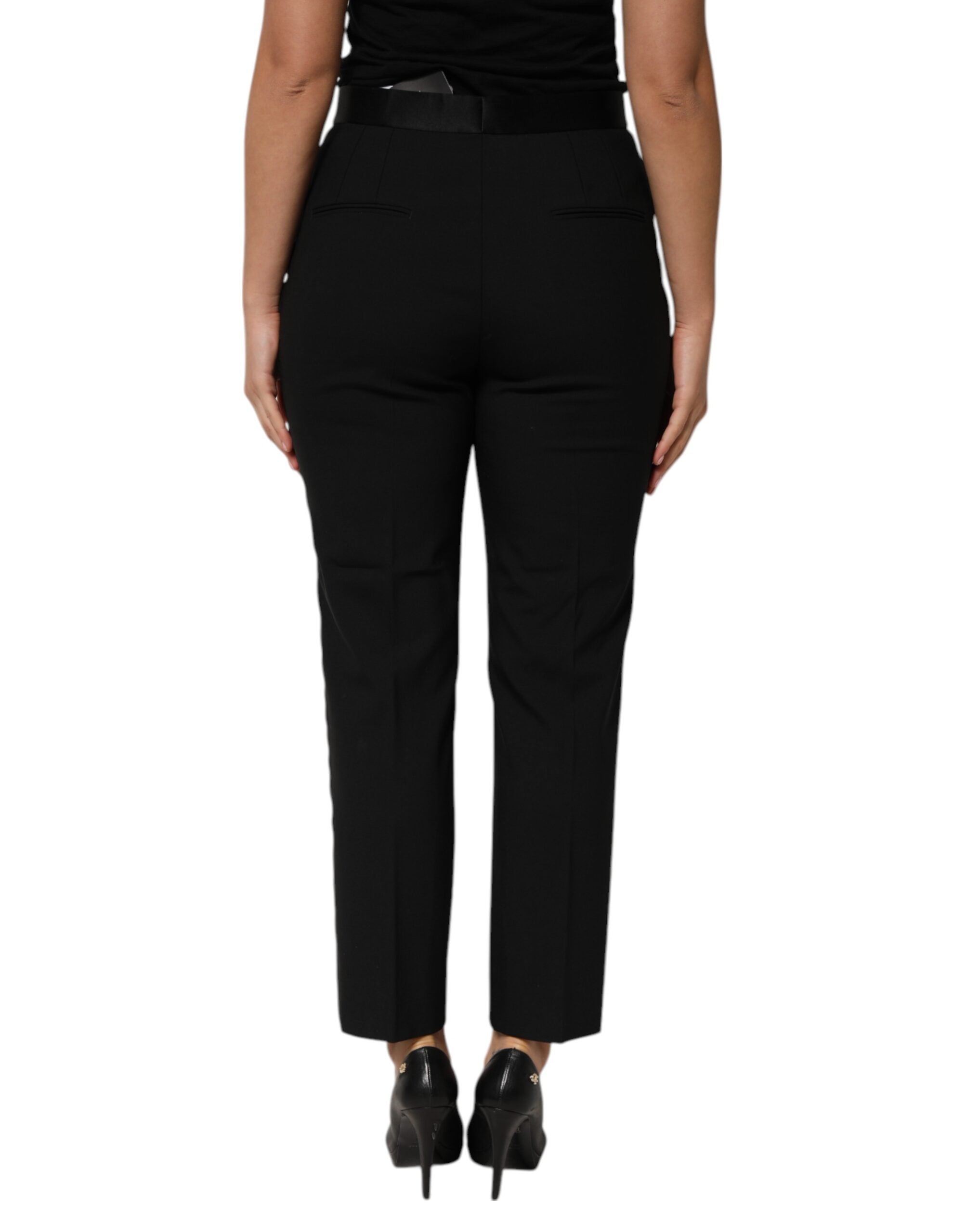 Pantalon noir en laine Dolce & Gabbana, pantalon taille haute et coupe tapered, vue de face.