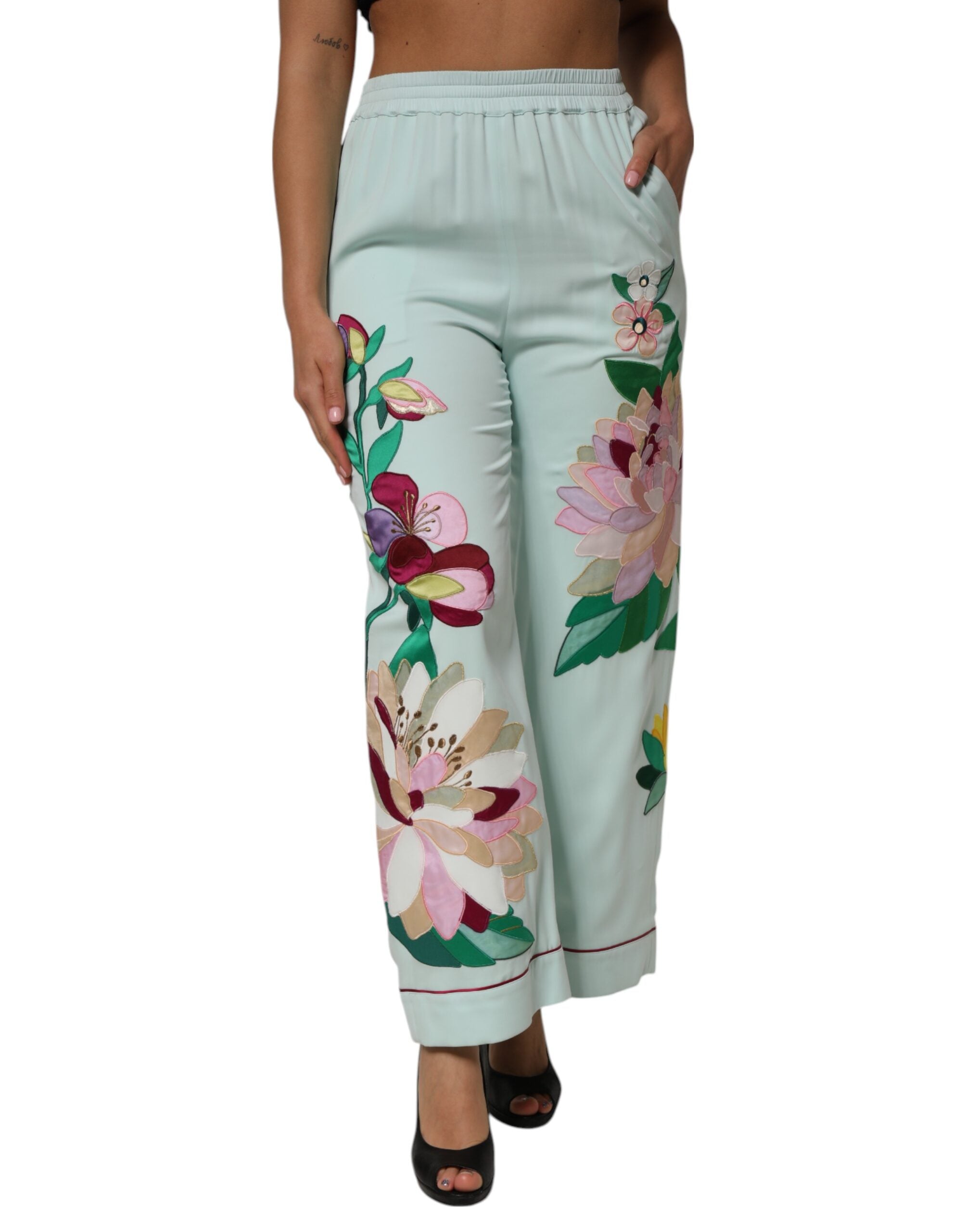 Pantalons de pyjama Dolce & Gabbana à fleurs vertes, coupe droite, avec ceinture élastique et détails de jarretière.