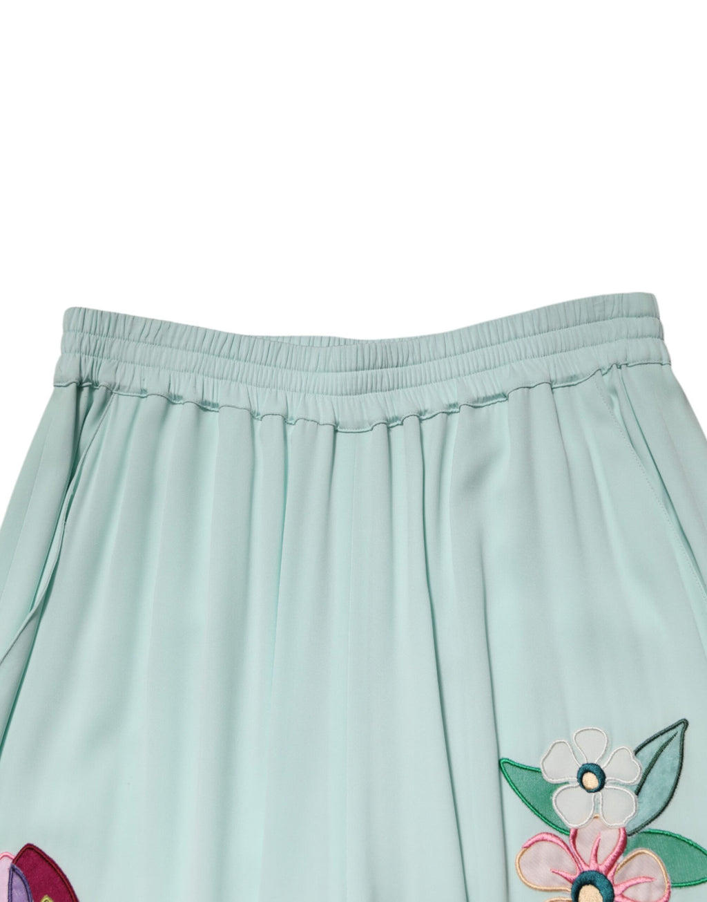 Pantalon de pyjama droit fleuri vert Dolce & Gabbana avec ceinture élastique, tissu léger et confortable.
