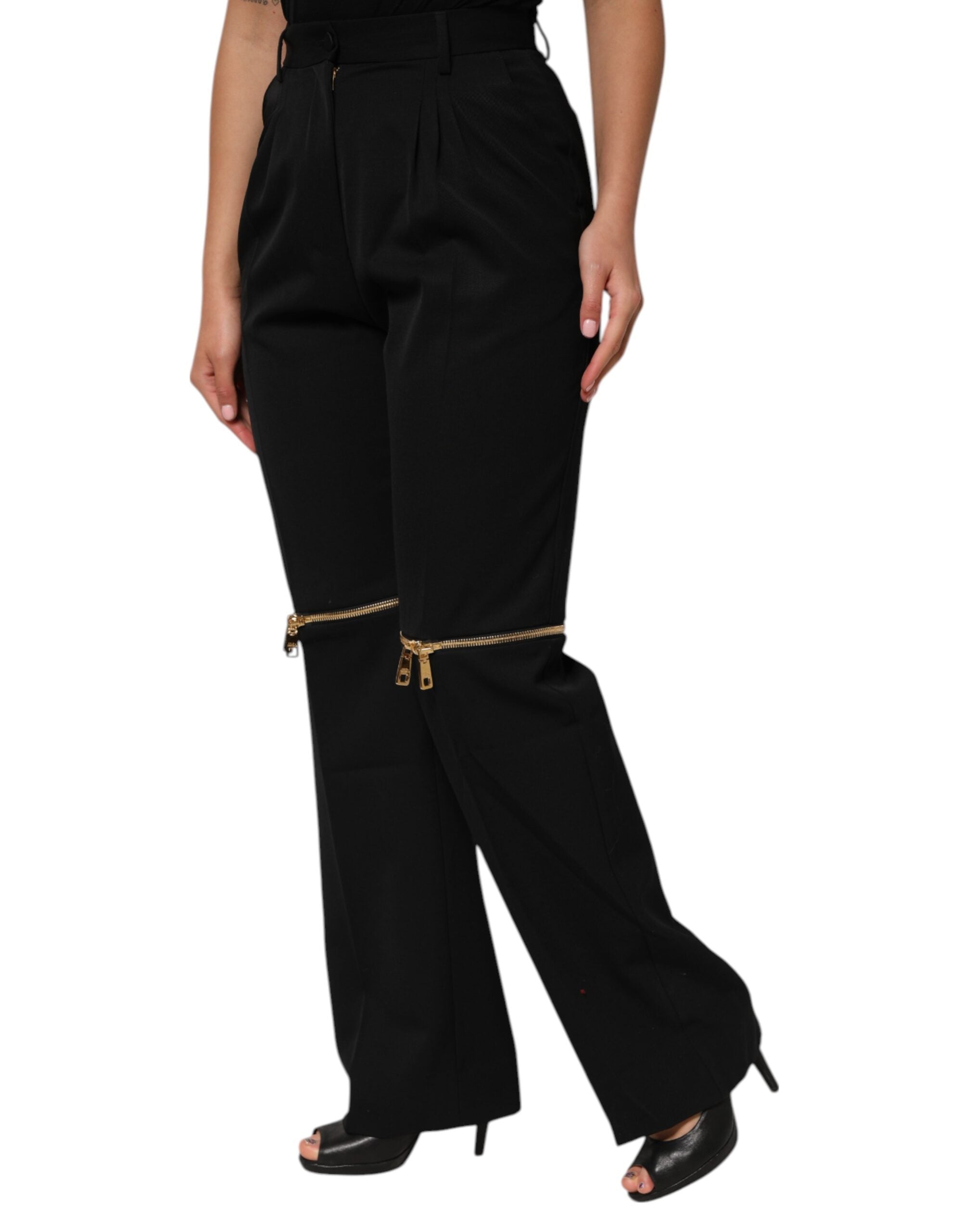 Pantalons en laine noire Dolce & Gabbana avec fermeture éclair et coupe droite, détails zippés élégants.