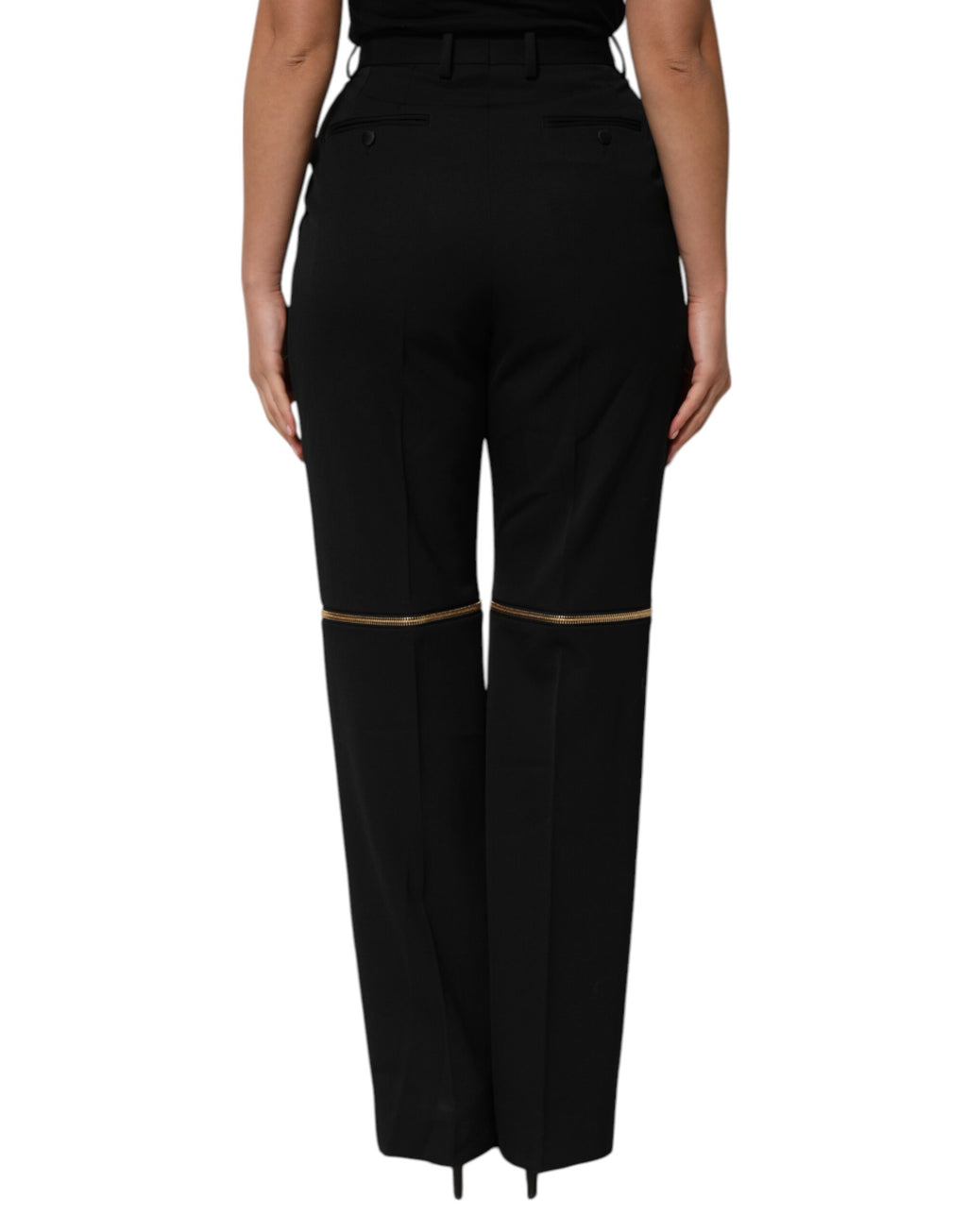Pantalons droits en laine noire Dolce & Gabbana avec fermeture éclair et détails zippés visibles sur l'image.