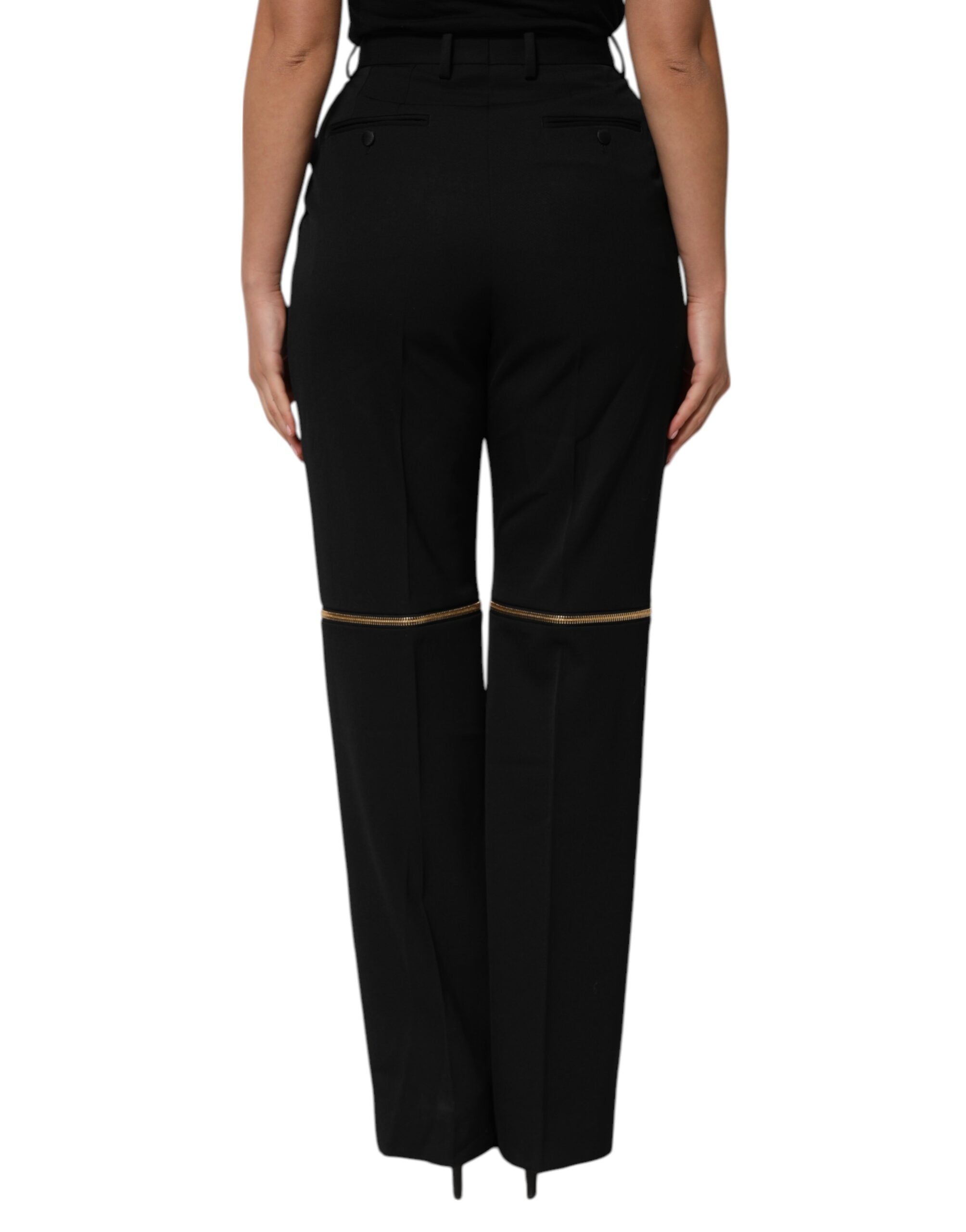 Pantalons droits en laine noire Dolce & Gabbana avec fermeture éclair et détails zippés visibles sur l'image.