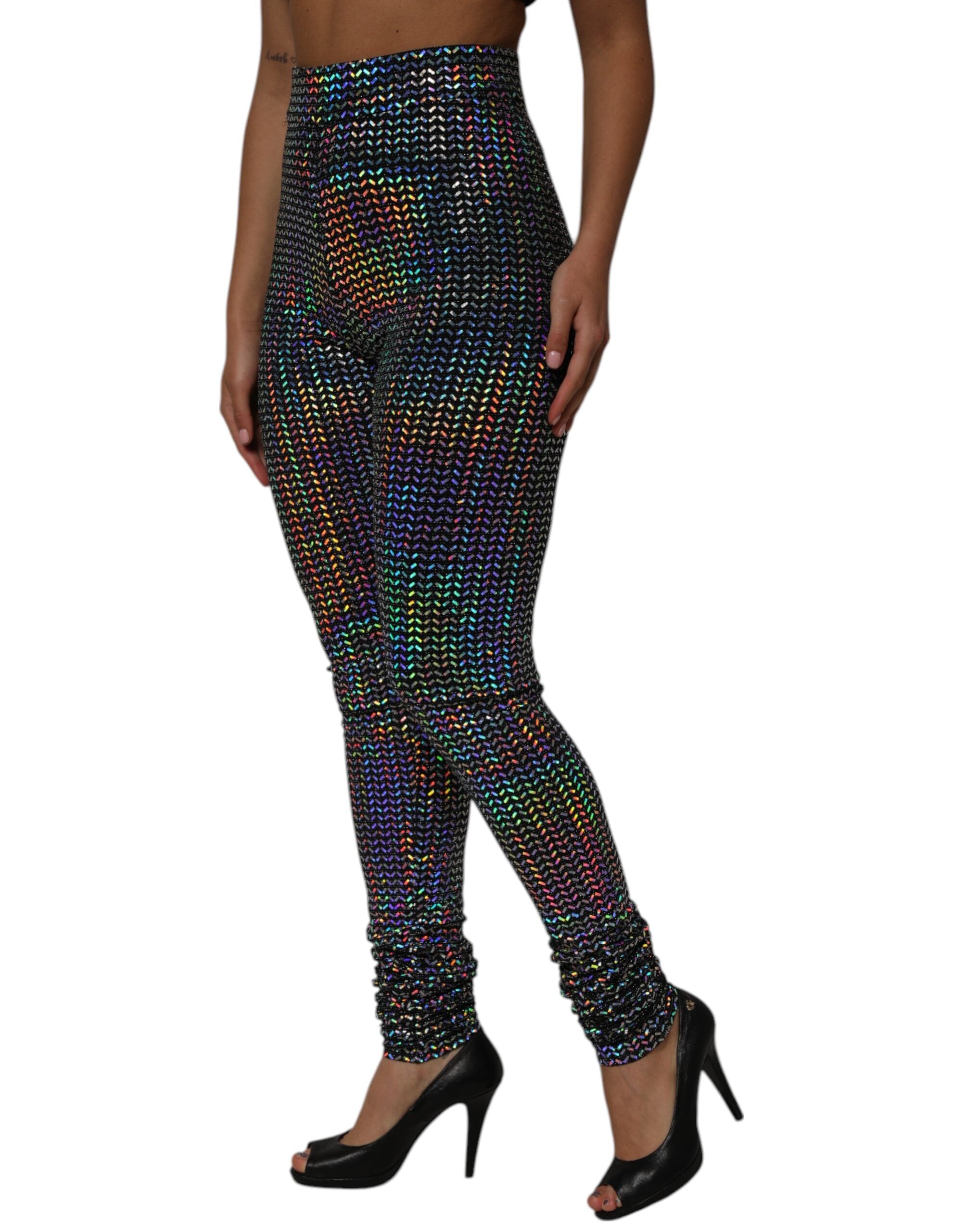 Leggings Dolce & Gabbana à sequins multicolores, pantalon élégant avec tissu brillant et détails colorés.