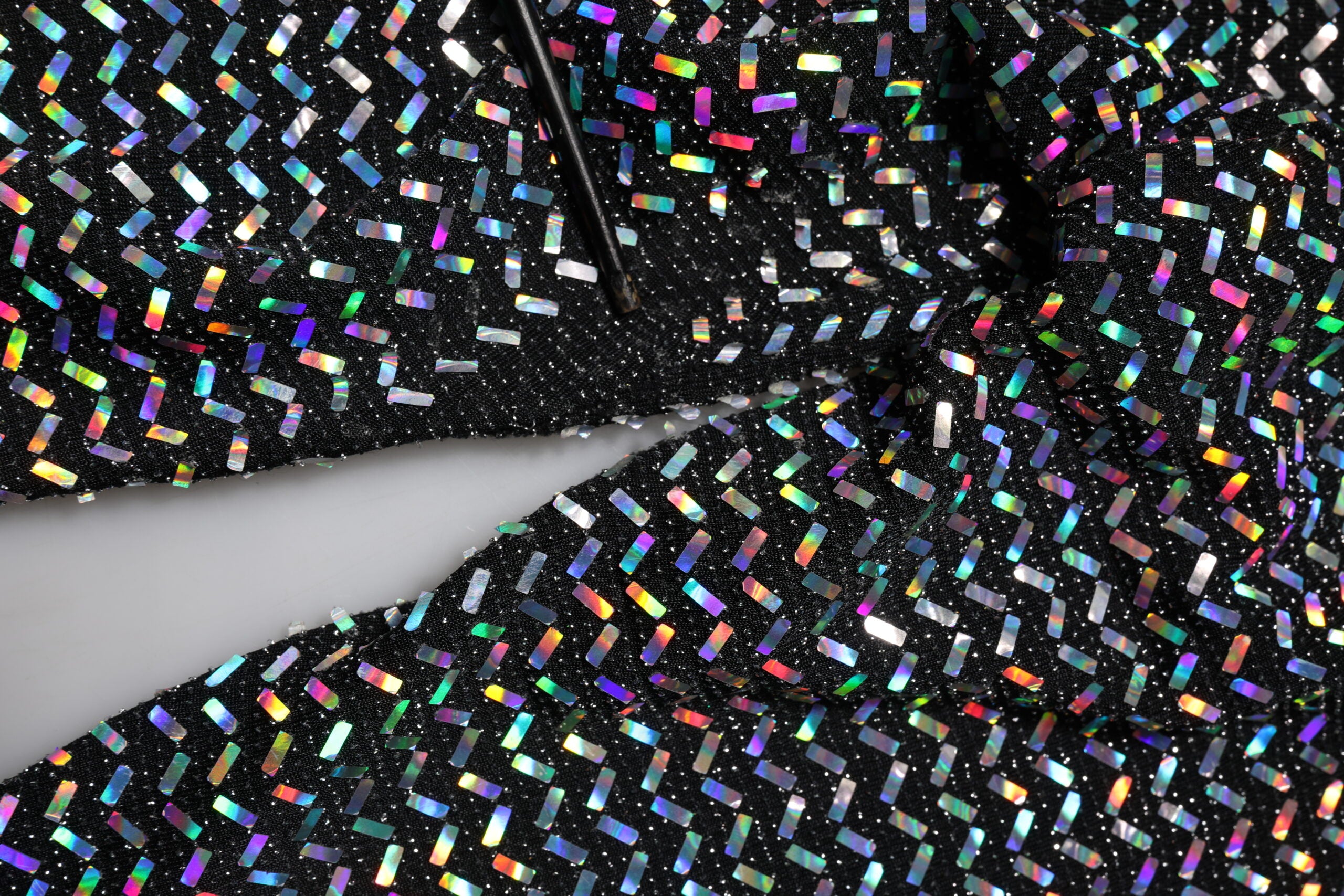 Leggings Dolce & Gabbana à sequins multicolores, pantalons moulants en tissu brillant et coloré.