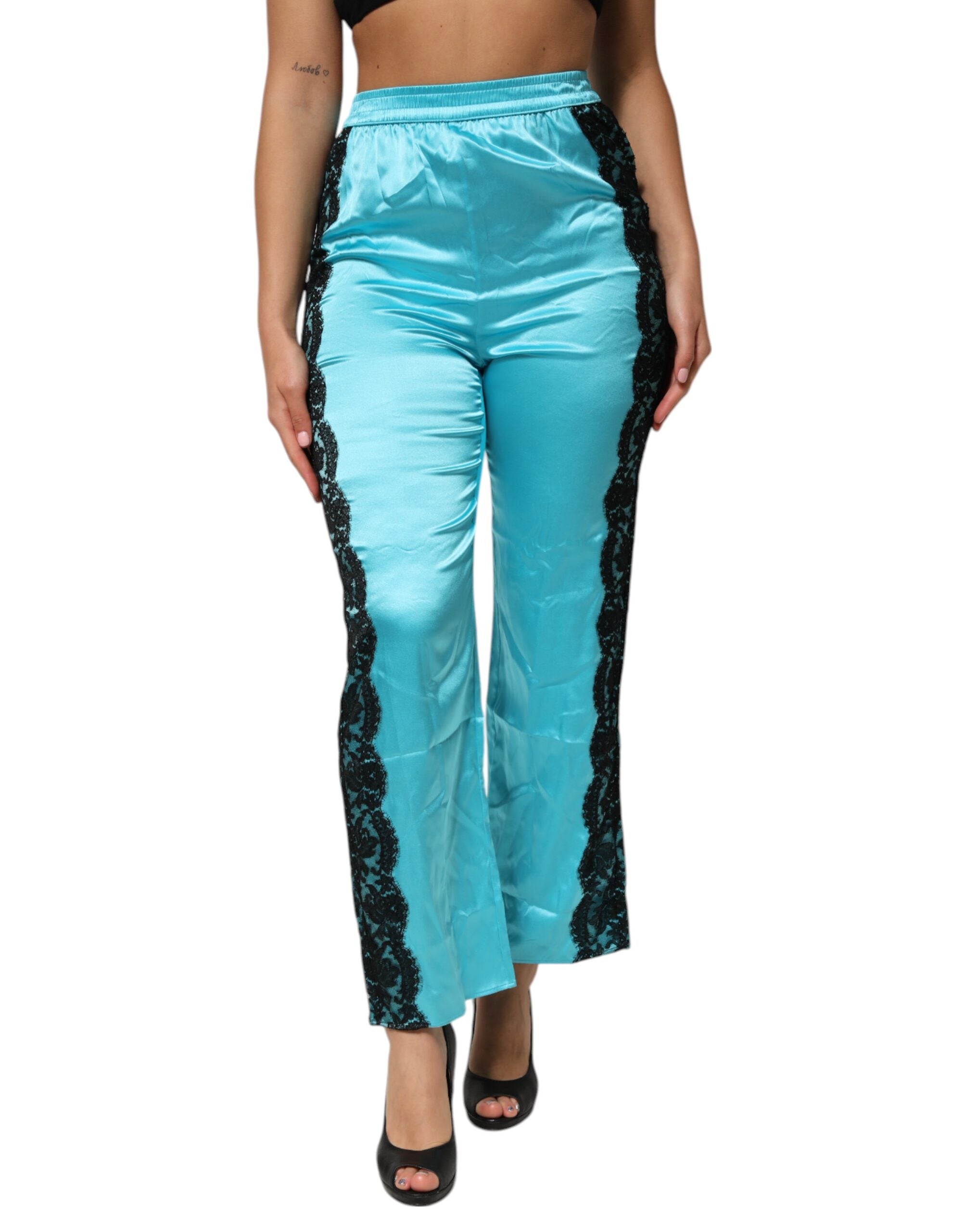 Pantalon de pyjama femme Dolce & Gabbana en soie bleue, coupe droite et élastiquée, élégant et confortable.