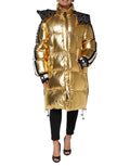 Veste matelassée dorée à capuche Dolce & Gabbana, blouson puffer zippé, style chaud et élégant, vue de face.