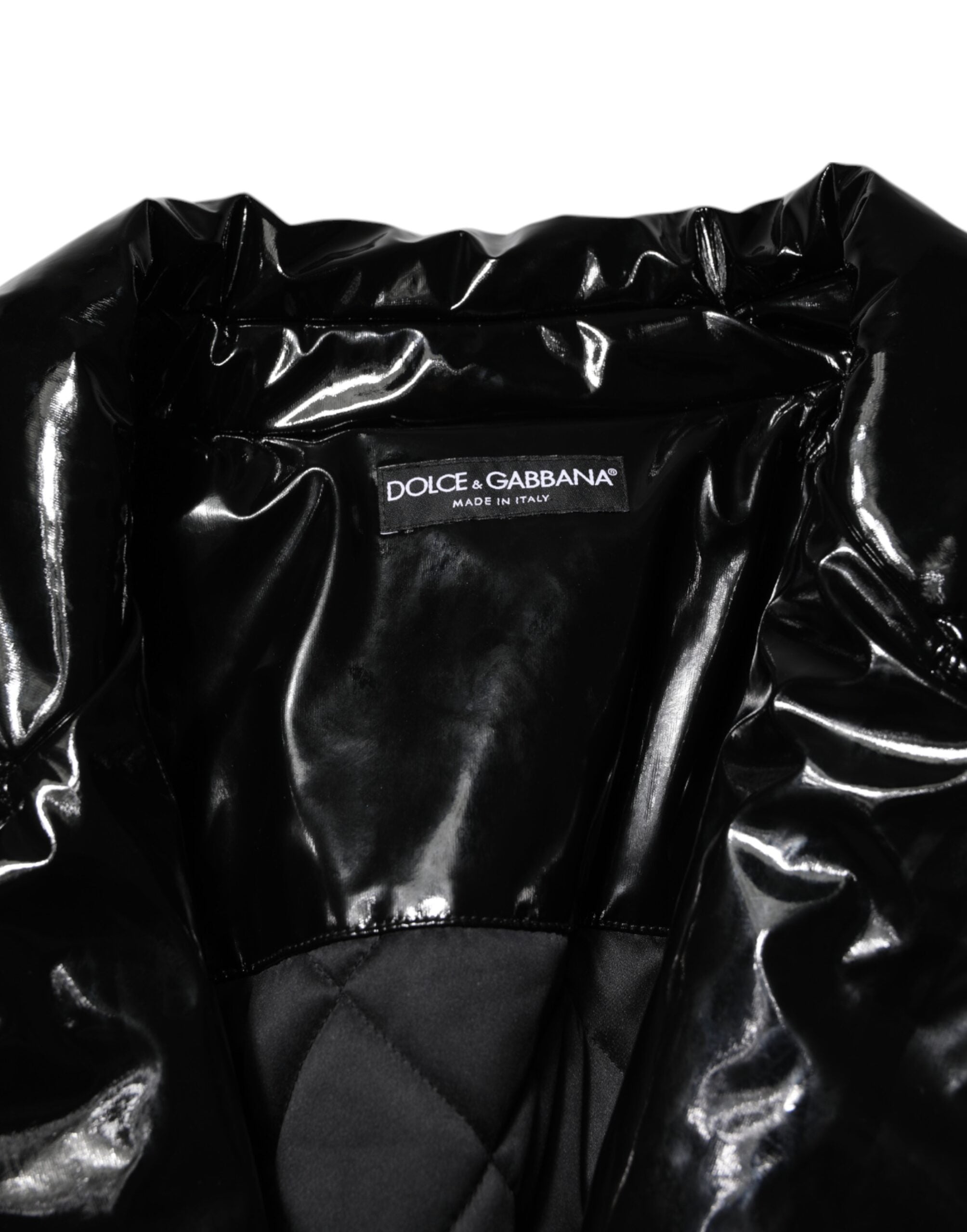 Manteau matelassé noir en polyester de Dolce & Gabbana, veste puffer élégante avec doublure rembourrée et design chic.