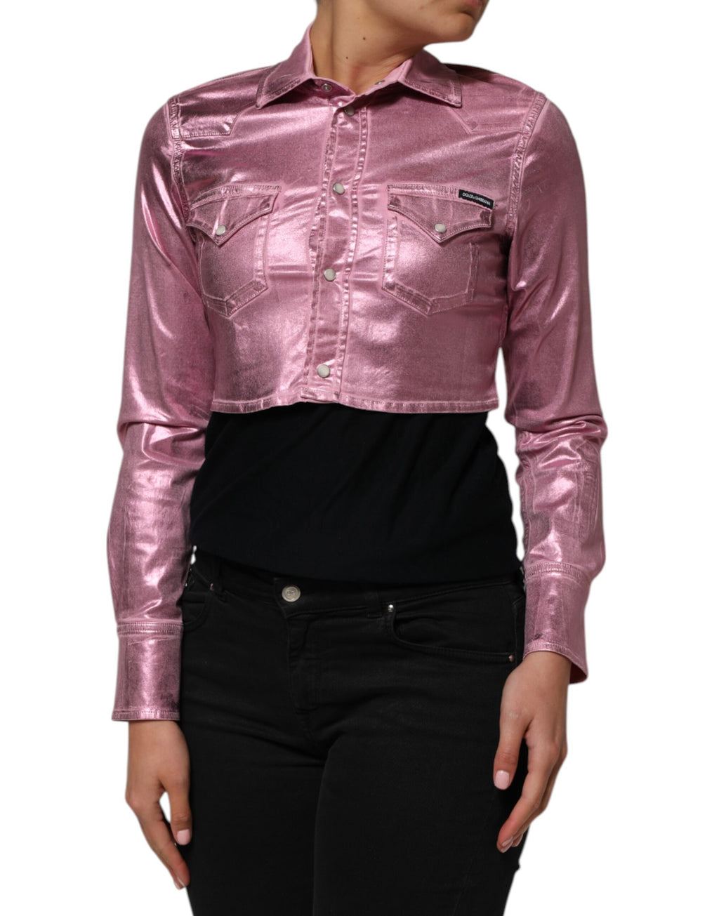 Veste courte en coton rose Dolce & Gabbana avec col classique, ajustée, visible sur fond neutre.