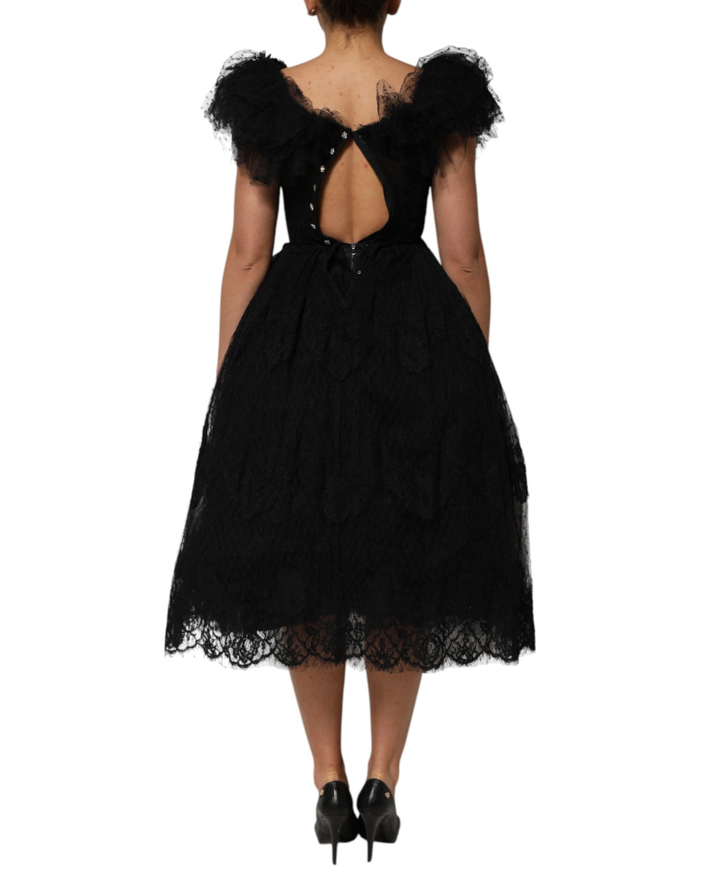 Robe midi noire Dolce & Gabbana en ligne A avec cristaux embellis, coupe élégante et détails brillants visibles sur l'image.