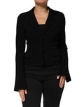 Blazer noir en viscose Dolce & Gabbana à simple boutonnage, coupe élégante et finition classique, porté sur un mannequin.