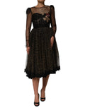 Robe trapèze noire Dolce & Gabbana ornée de cristaux en forme de cœur, élégante et sophistiquée.