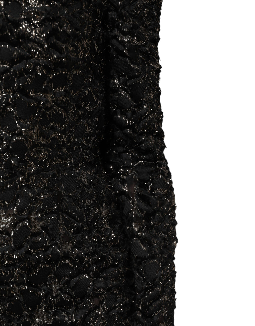 Robe noire Dolce & Gabbana en tweed bouclé à sequins, coupe ajustée, élégante et sophistiquée, vue de face.