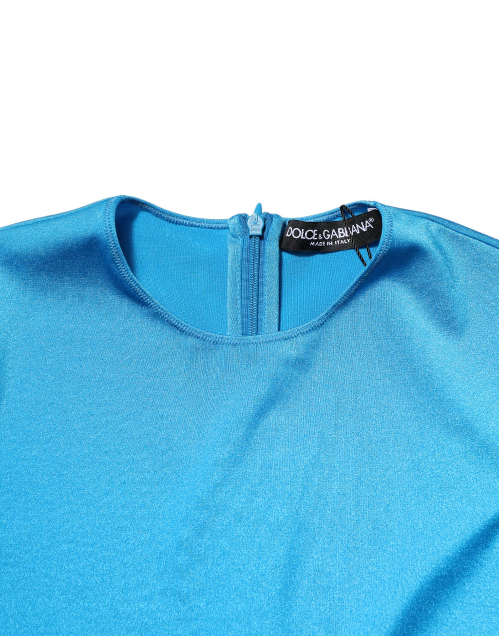Combinaison moulante en nylon bleu Dolce & Gabbana avec col rond, ajustée et élégante, vue de face.