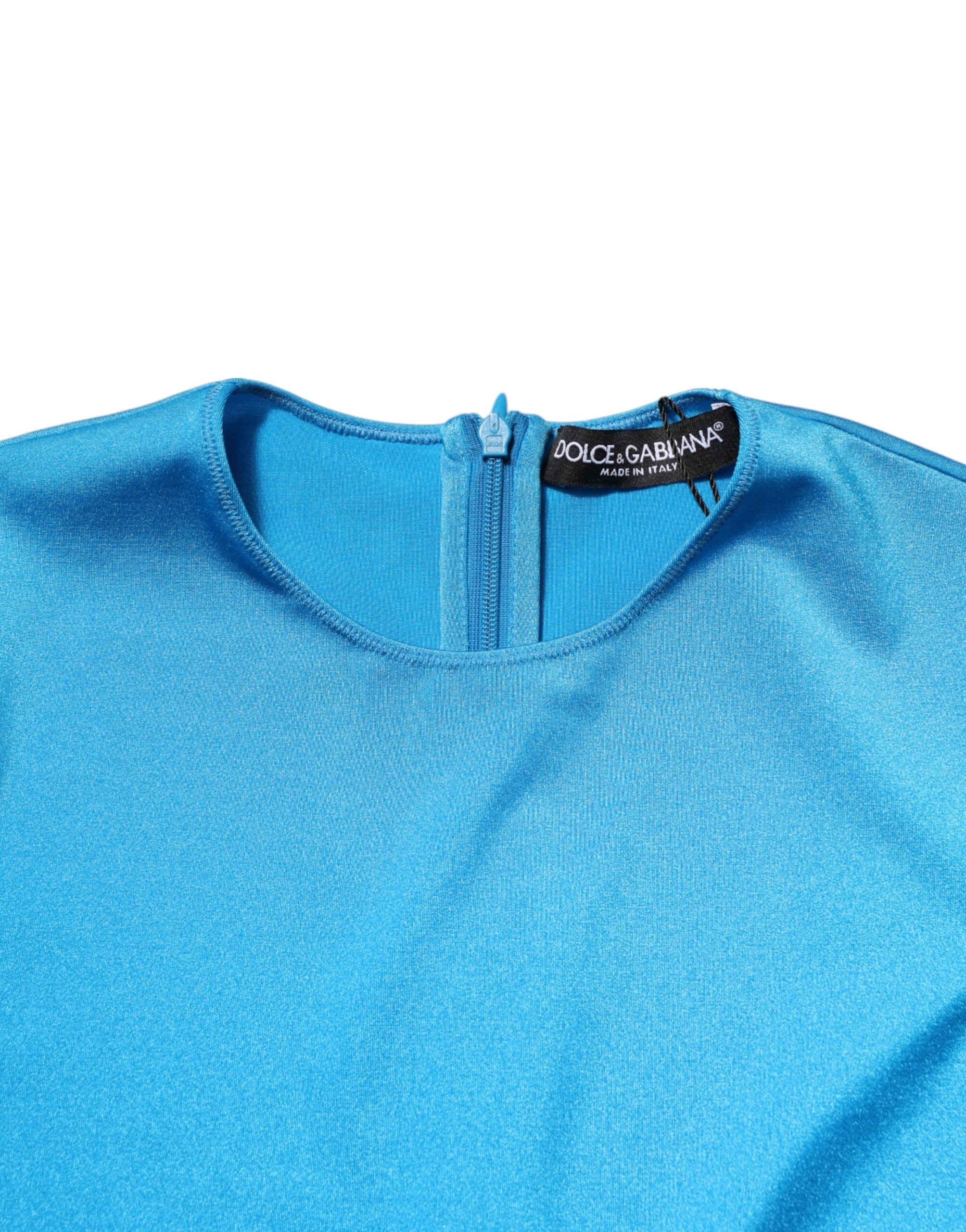Combinaison moulante en nylon bleu Dolce & Gabbana avec col rond, ajustée et élégante, vue de face.