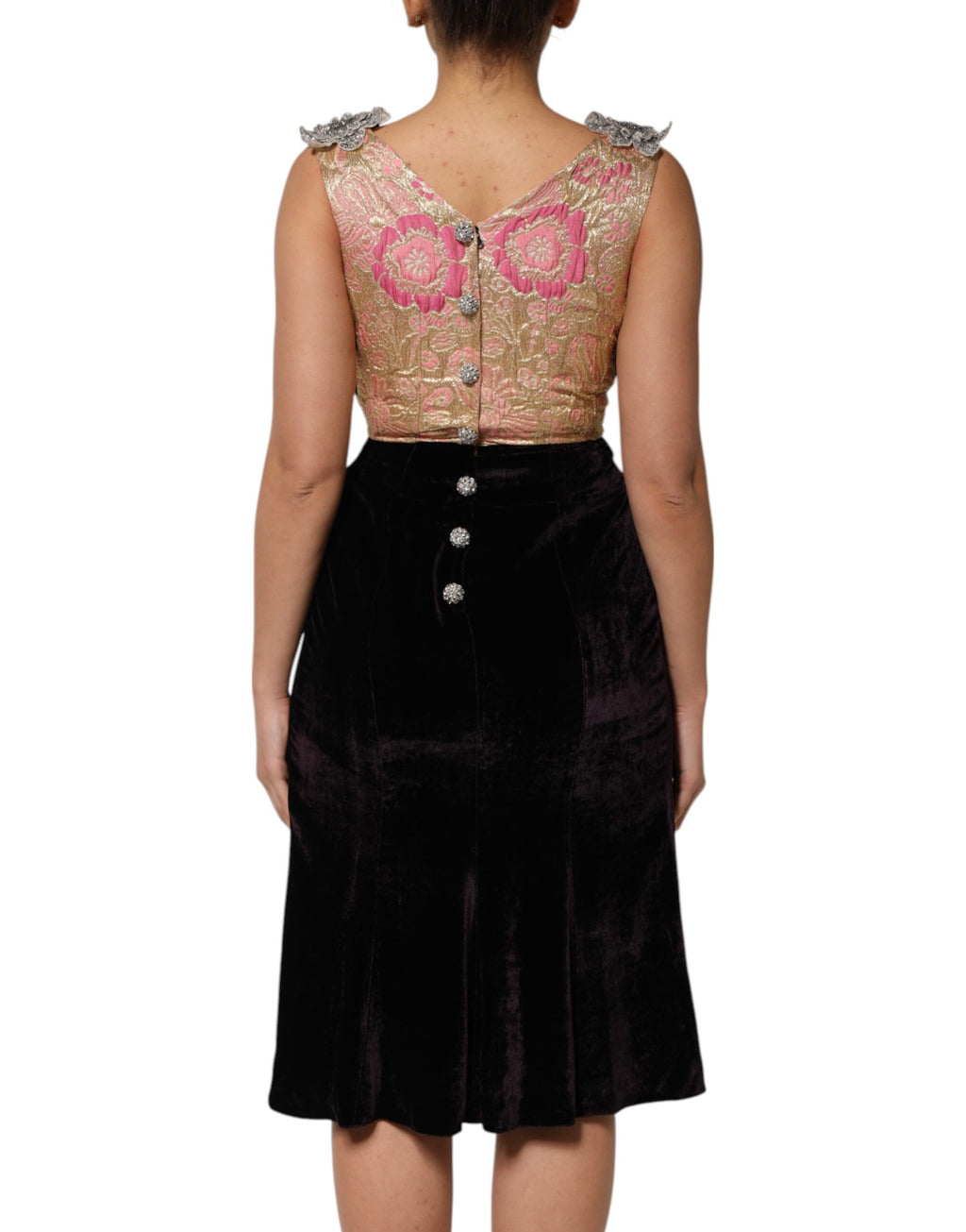 Robe Dolce & Gabbana en velours noir avec embellissements floraux, coupe évasée élégante et sophistiquée.
